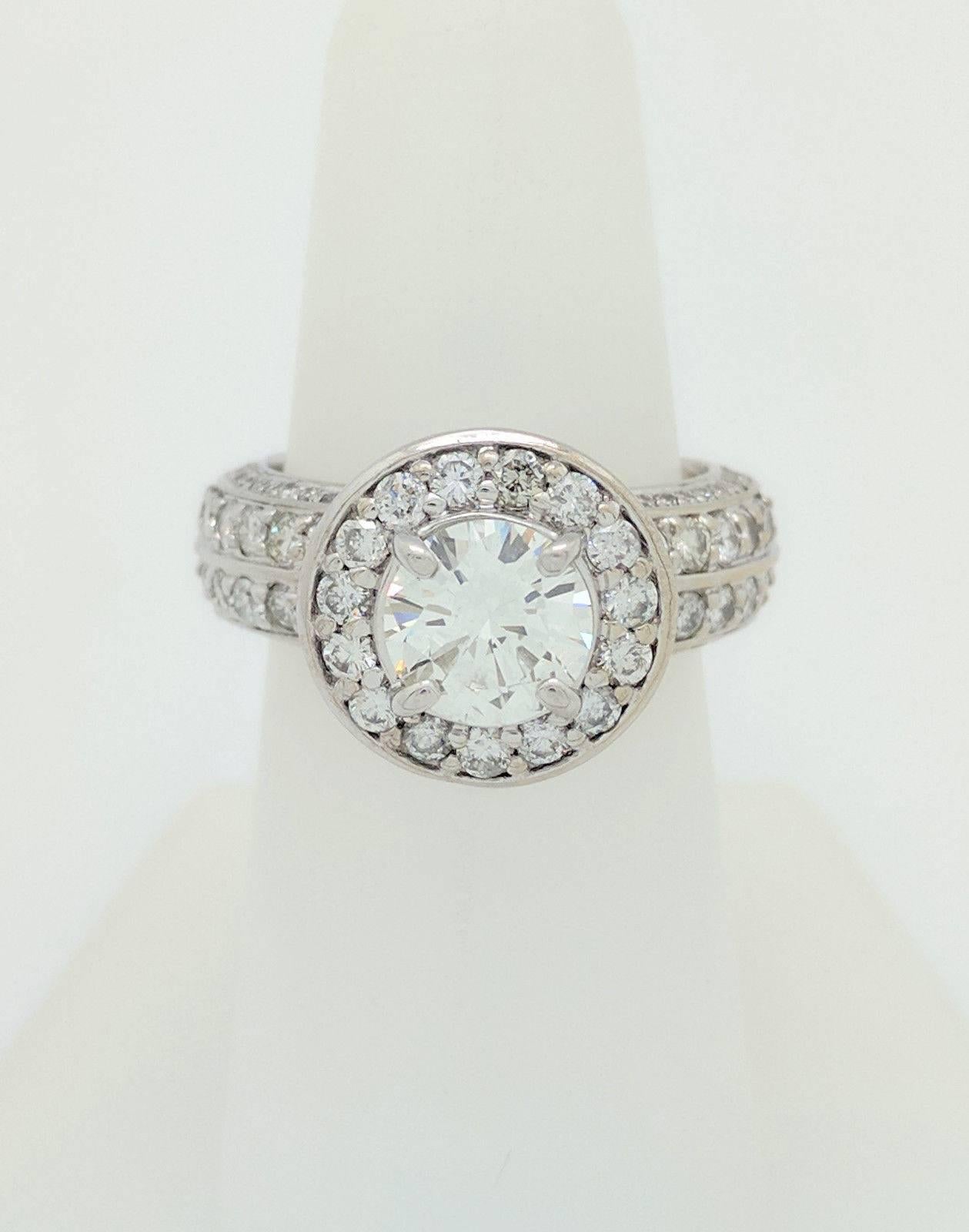 14K White Gold 1.30ct Round Brilliant Cut Diamond Halo Engagement Ring SI1/G

You are viewing a 1.30ct natural round brilliant cut diamond set in a stunning halo engagement ring. The center stone is beautifully displayed in a 14k white gold diamond