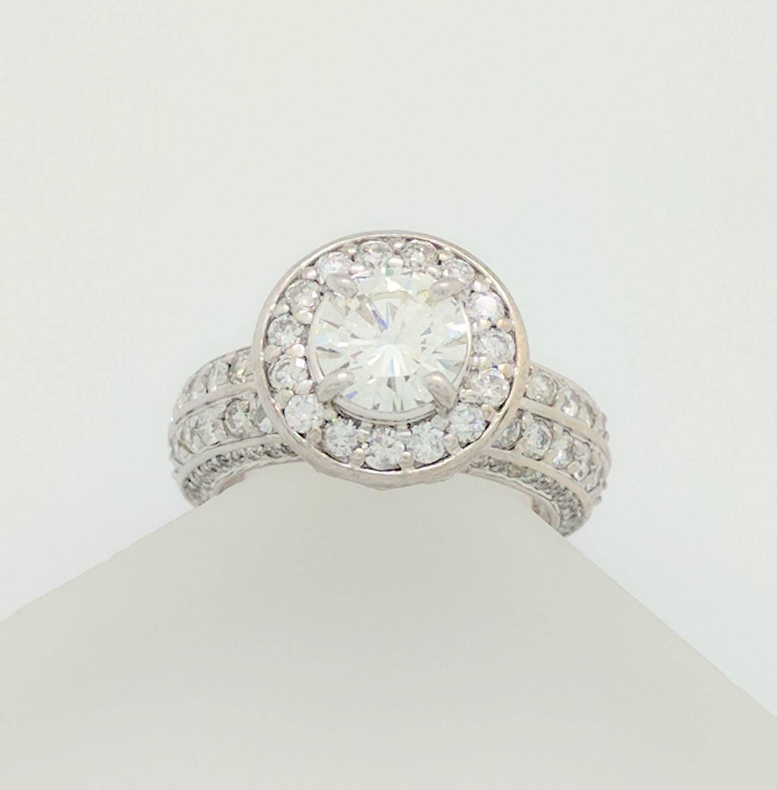 14 Karat White Gold 1.30 Carat Round Brilliant Cut Diamond Halo Ring SI1/G In Excellent Condition For Sale In Gainesville, FL