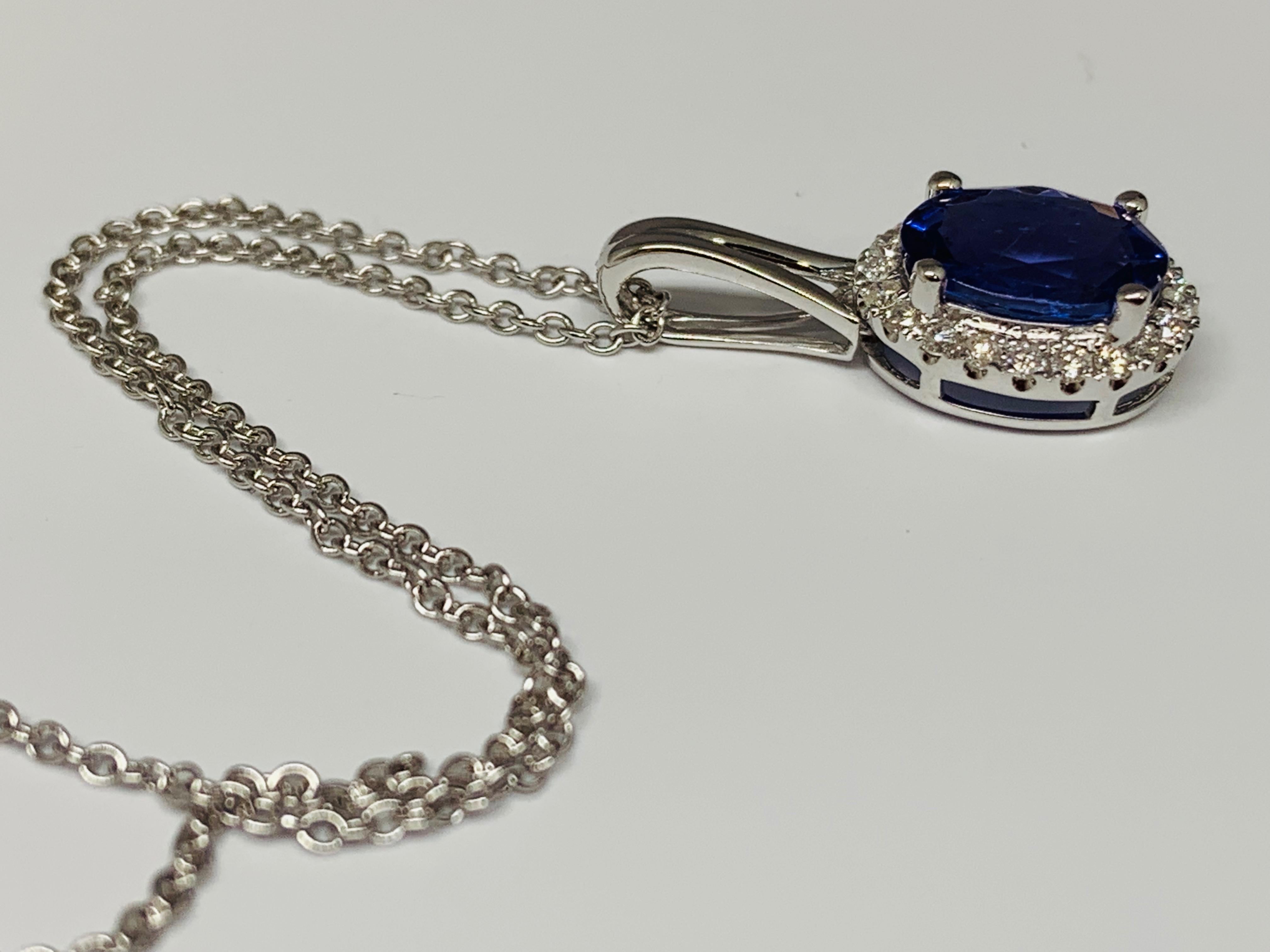 Oval Cut 14 Karat White Gold 1.38 Carat Total Weight Tanzanite and Diamond Necklace For Sale