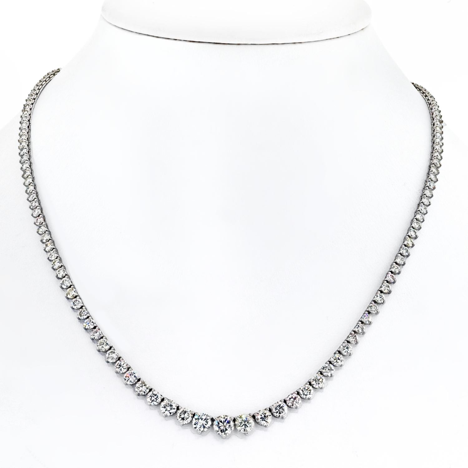 Elevate your style with the timeless beauty of the 14K White Gold Graduated Riviera Diamond Necklace. This exquisite piece is a testament to refined craftsmanship, showcasing a graduated arrangement of dazzling diamonds set in lustrous 14K white