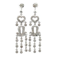 Orecchini chandelier con pendente a forma di cuore in oro bianco 14k con diamante da 1,48 carati