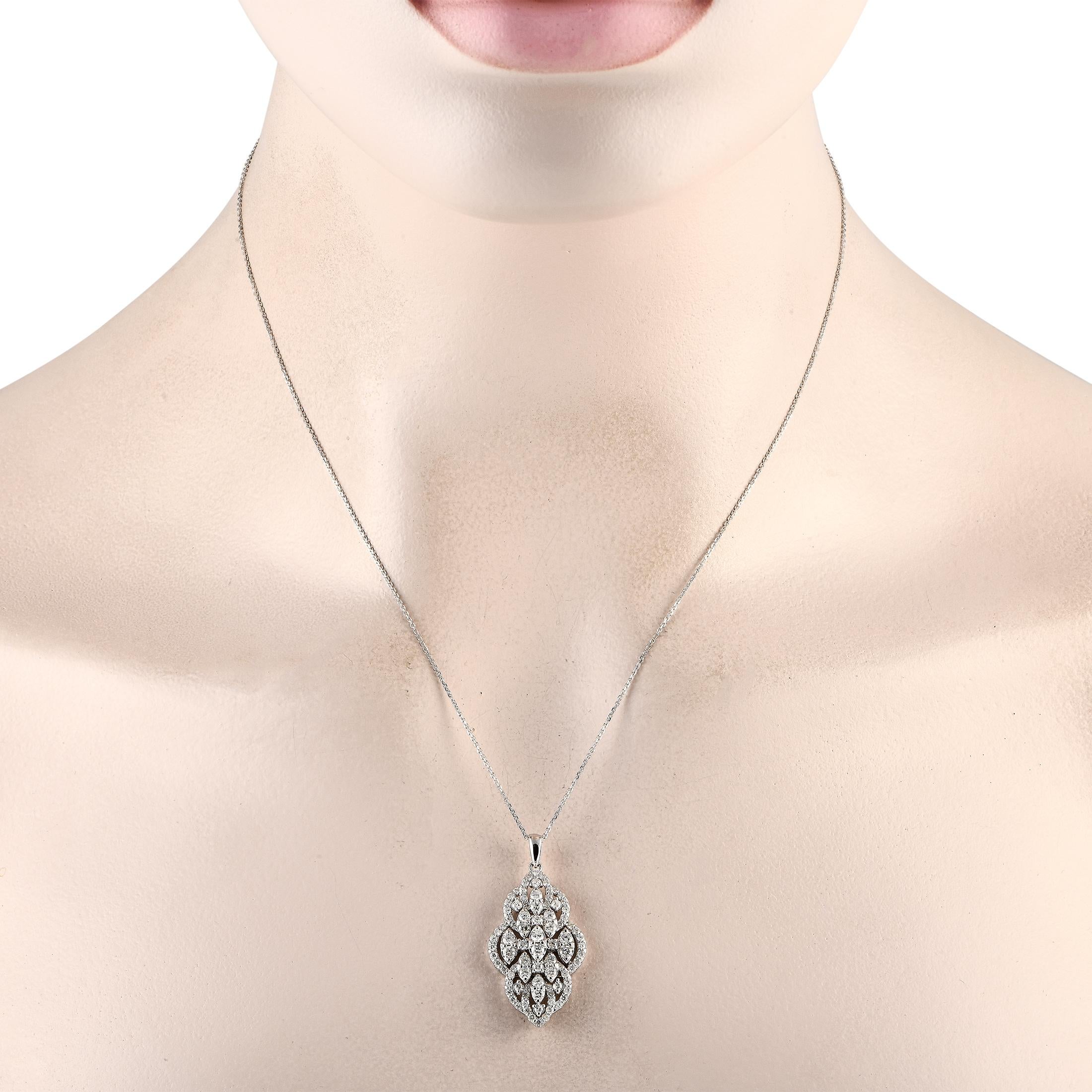 Diamonds with a total weight of 1.50 carats elevate this necklaces intricate 14K White Gold pendant. Equal parts delicate and dynamic in design, the pendant measures 1.5 long by 0.75 wide and is suspended from an 18 chain.This jewelry piece is