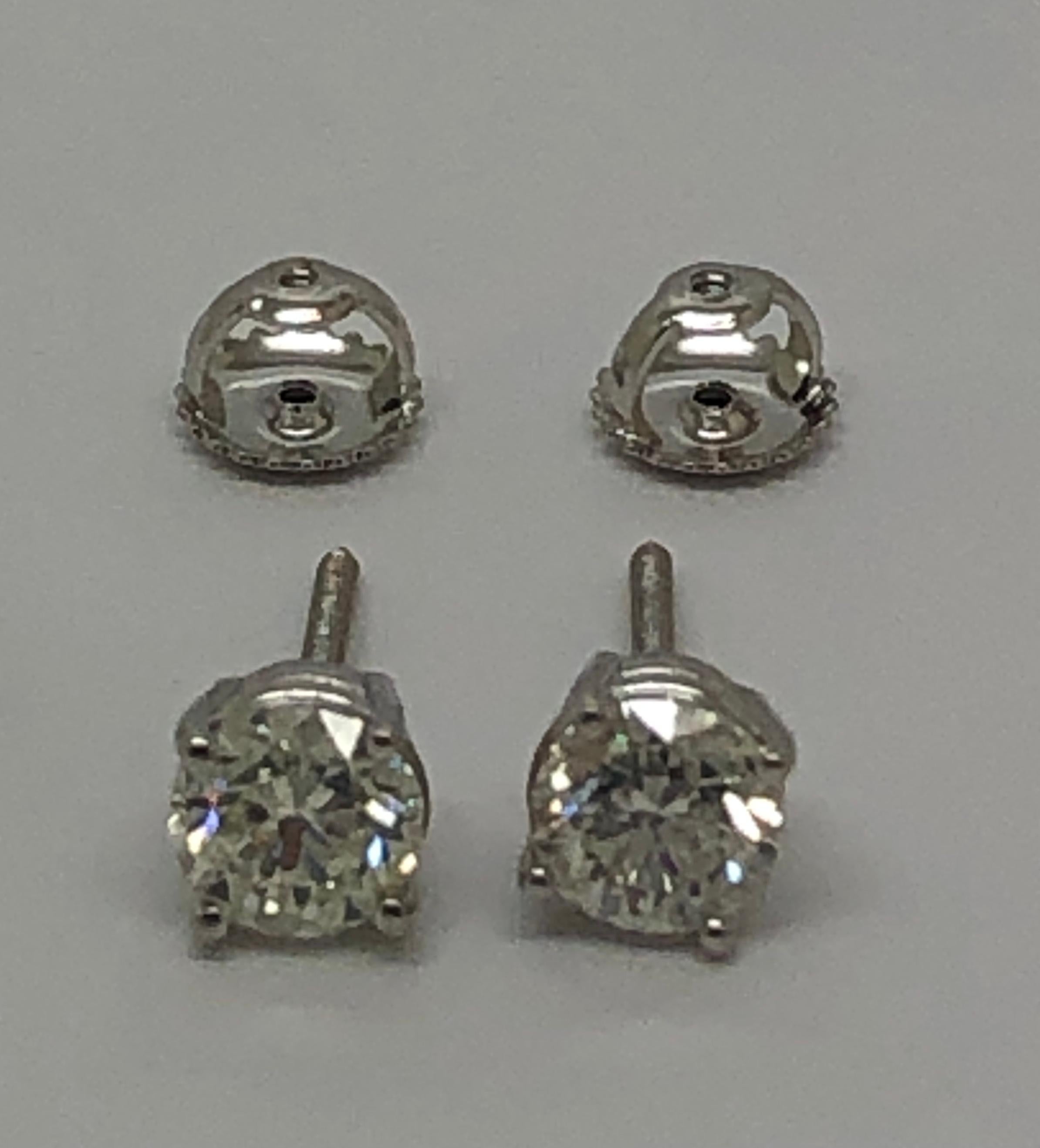 Up for sale: 

These great looking Solid 14K White Gold Round Cut Natural Diamond 4-Prong Solitaire Stud Earrings. The earrings are featuring 1.50ctw in round cut natural diamond; G color; SI1 thin white inclusion off to side eye clean top si1)