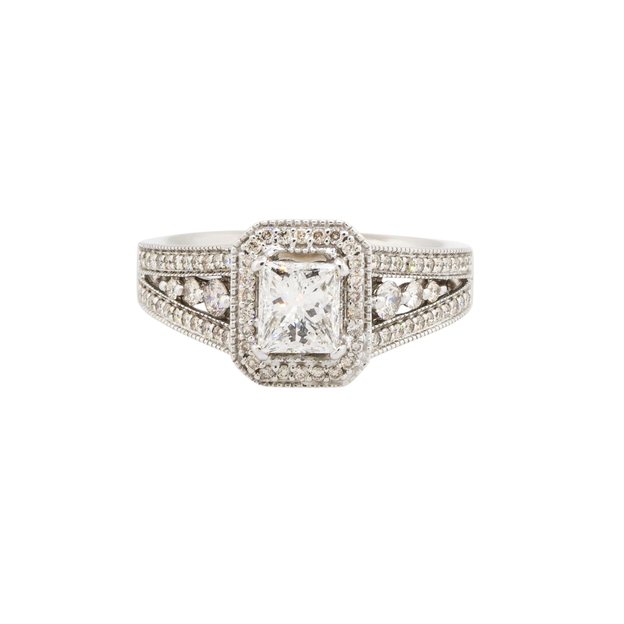 Material: 14k White Gold
Center Diamond Details: Approx. 1.00ctw princess cut Diamond. Diamond is I in color and I1 in clarity
Adjacent Diamond Details: Approx. 0.50ctw of round cut Diamonds. Diamonds are G/H in color and VS in clarity
Total weight: