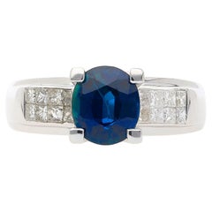 14K White Gold 1.56 Carat Oval Blue Sapphire and Invisible Cluster Diamond Ring