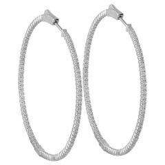 Boucles d
oreilles en or blanc 14K serties de 1,78ct diamant MF12-111825