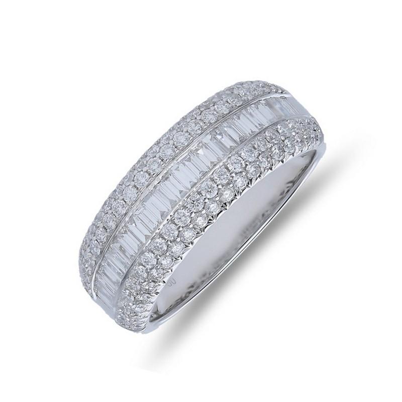 Diamond Carat Weight: This stunning 1981 Classic Collection Ring boasts a total of 1.5 carats of diamonds. The ring features 90 round-cut diamonds and 19 baguette-cut diamonds, all chosen for their exceptional quality and brilliance.

Gold Type:
