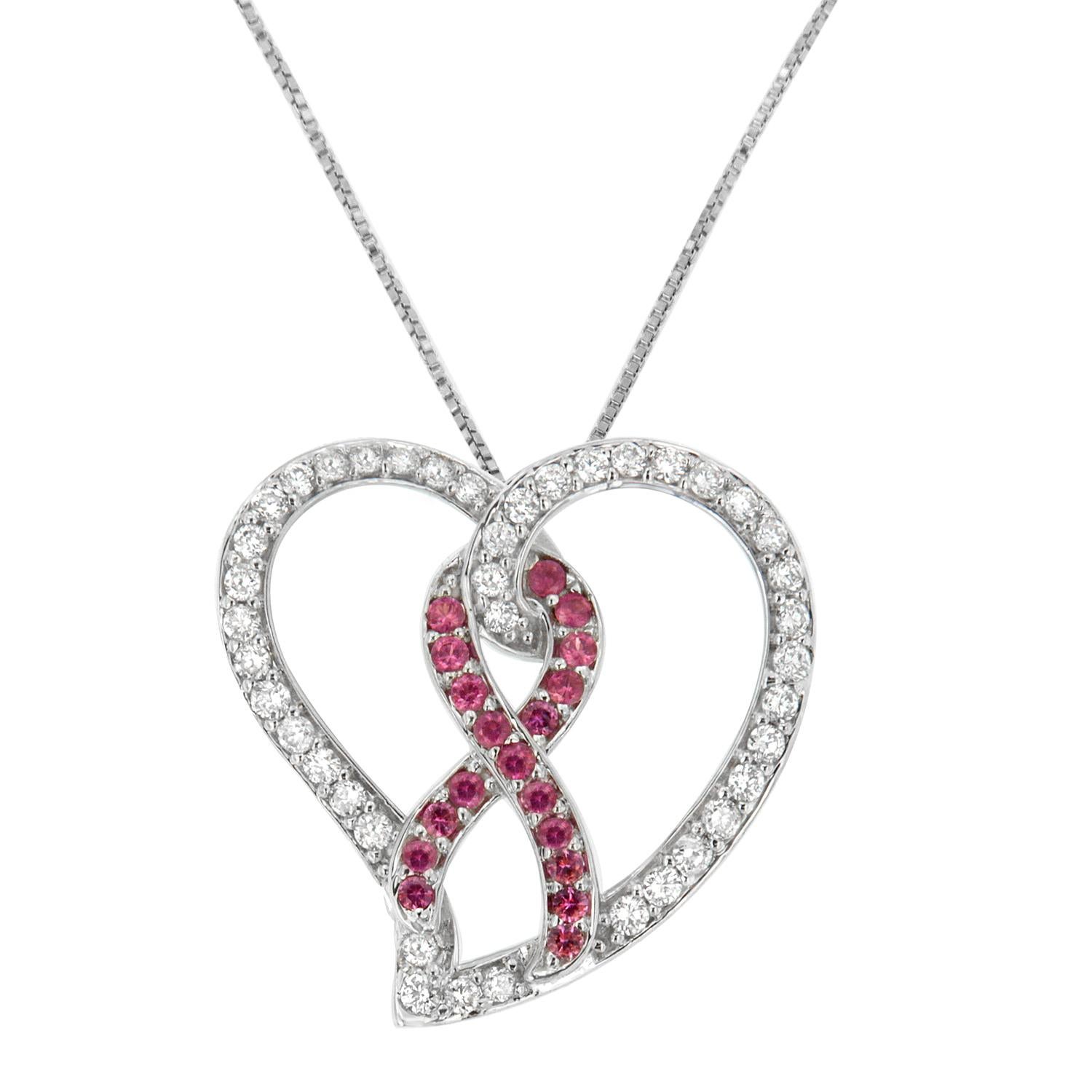 Brighten her gorgeous look with this stunning diamond pendant. Designed in the shape of a heart and featuring bow accent in the center, it is crafted of 14 karats white gold and polished high to shine. And, the embellishment with white and pink