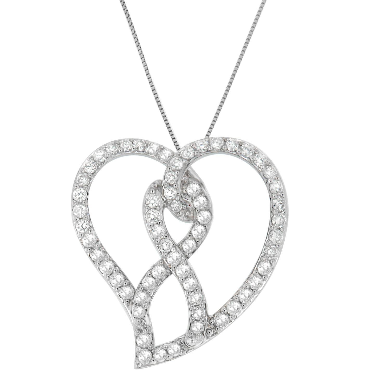 Revamp her Valentines Day look with this beautiful Heart Pendant. Chisel to excellence, it is created with 14 karats white gold and features ribbon accent in the center. Sophisticated yet dazzling, this classy ornament is adorned with shimmery round