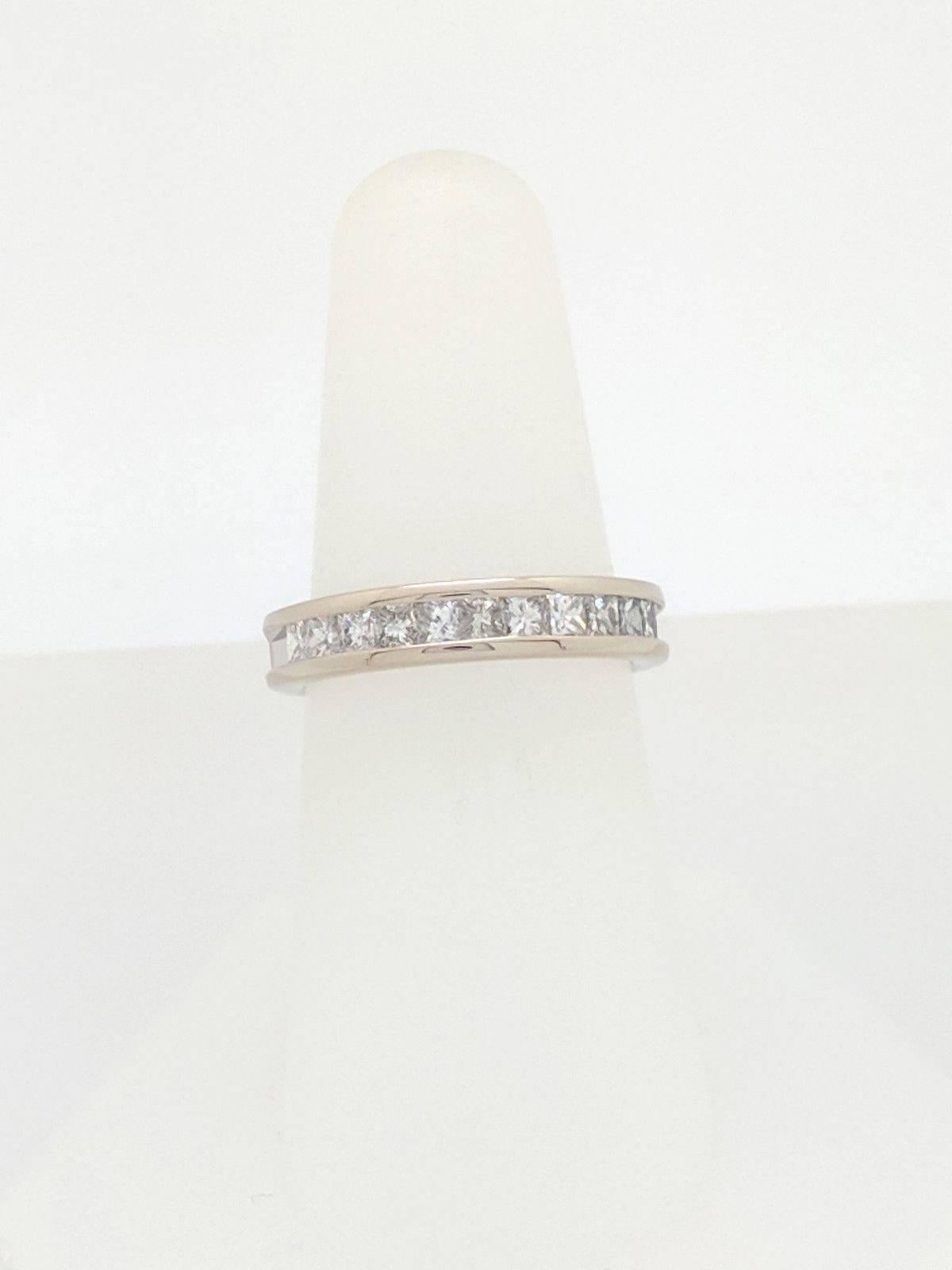 14K White Gold 1ctw Princess Cut Channel Set Diamond Wedding Band Ring Size 7

You are viewing a beautiful channel set diamond wedding band. This band is crafted from 14K white gold and weighs 4.5 grams. This ring features (11) natural princess cut