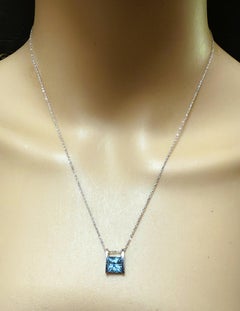 14k White Gold 2 Carat Radiant Cut Blue Topaz Pendant & Diamond Cut Necklace