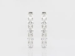 Pendientes de aro tipo «huggie» de oro blanco de 14 quilates con un diamante de corte redondo de 2 quilates