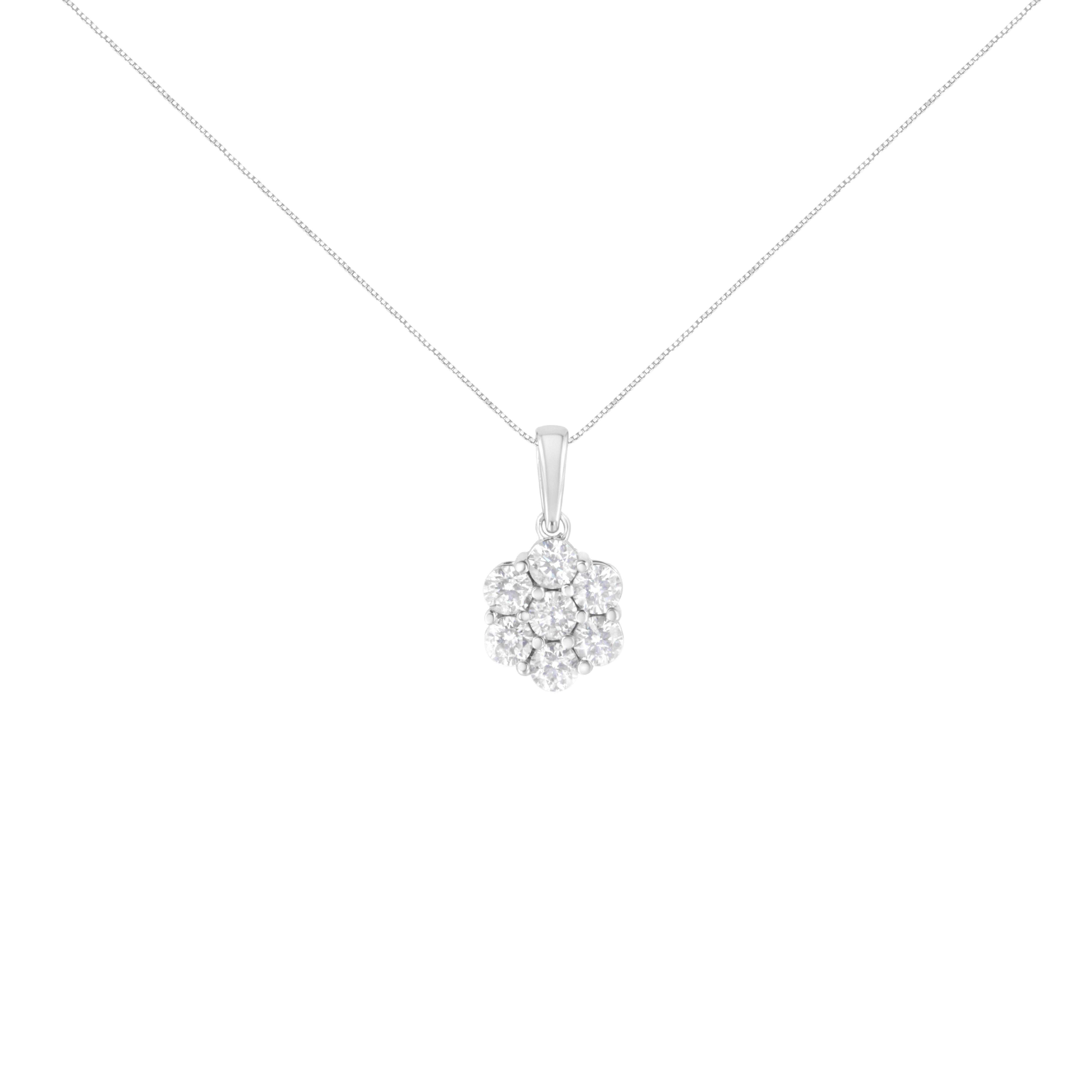 Chic and trendy, this elegant 14k white gold pendant has a floral design set with 7 round-cut, natural diamonds in a prong setting. The diamonds shine and has an impressive total carat weight of 2 cttw. The floral motif hangs from a 18