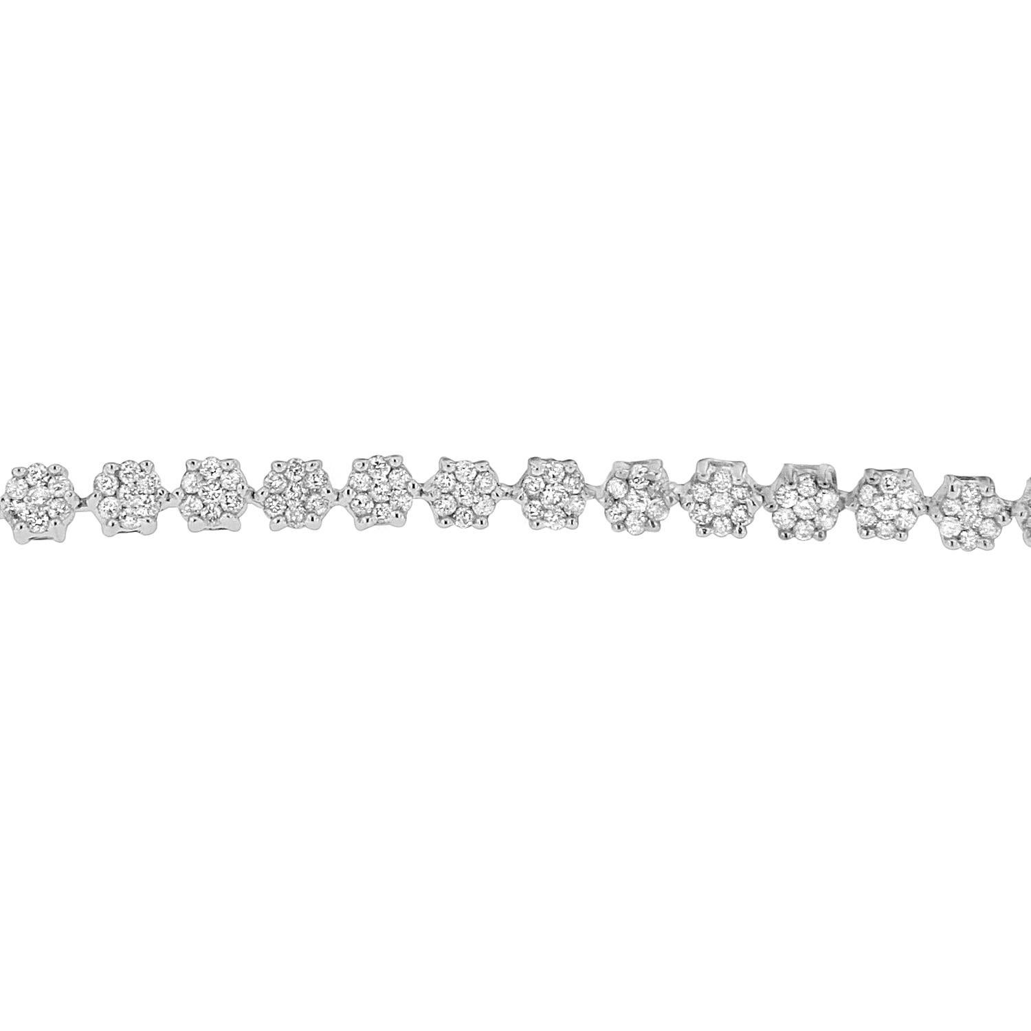 Shell love to show off this classic diamond bracelet. Created in sleek 14 karats white gold, this stunning bracelet features flower shape with flickering round cut diamonds. Stylish and meaningful, this graceful bracelet will get fit on your wrist