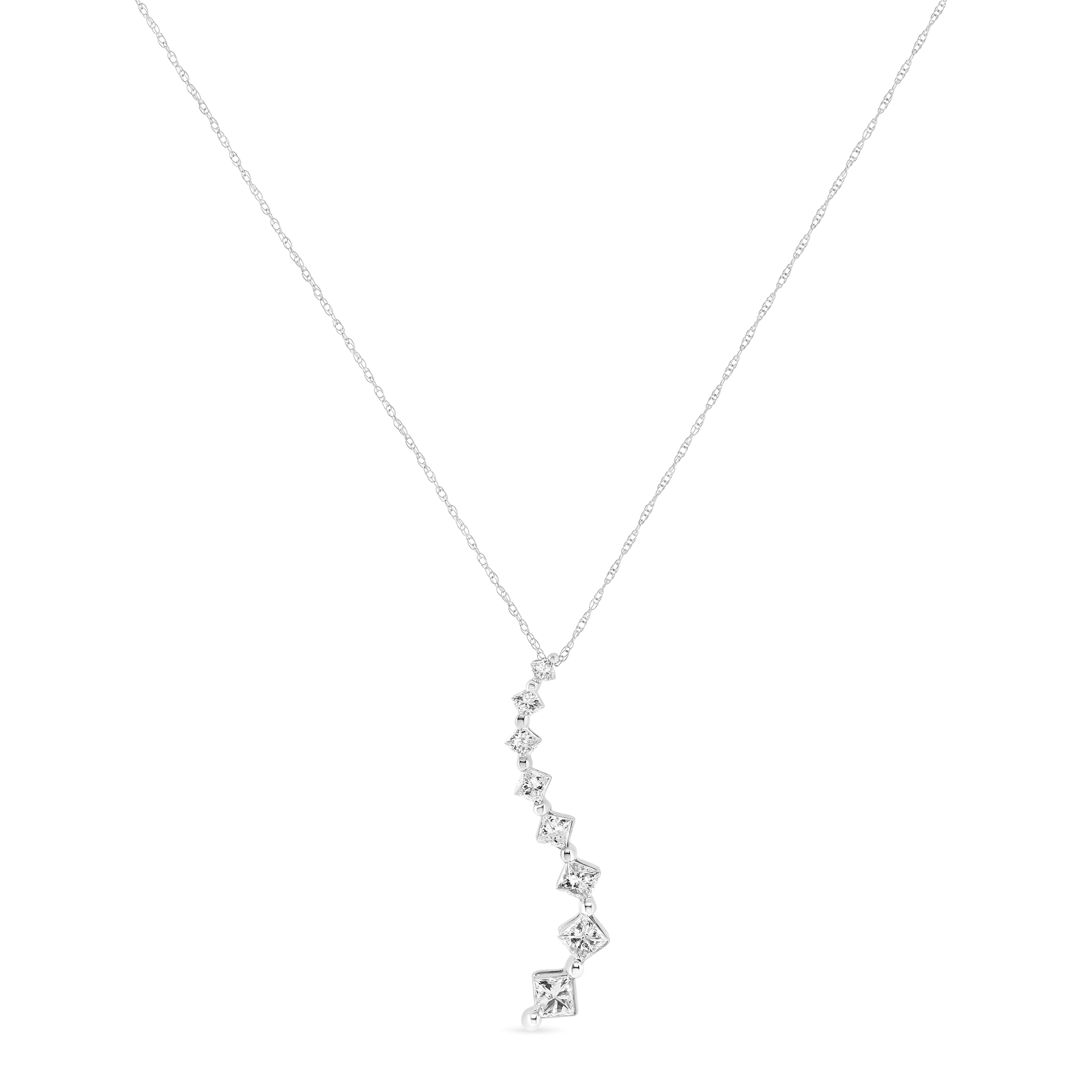 This exquisite journey pendant necklace is a statement piece you'll want to add to your jewelry collection. Made from cool weaves of 14k white gold, this design features 2.00 cttw of princess and baguette diamonds. Sparkling princess cut diamonds