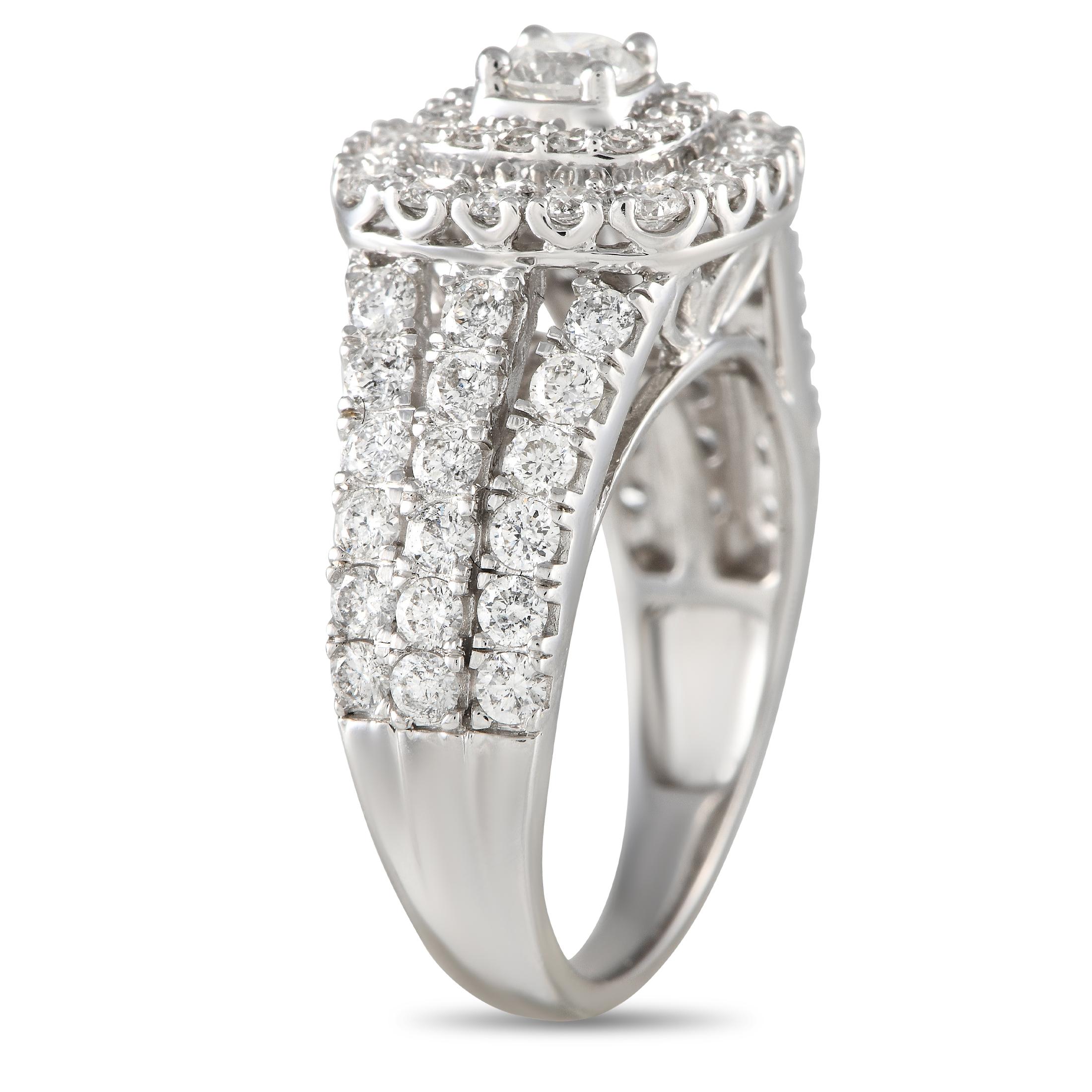 Vintage lovers will easily fall in love with this sparkler that looks like it belongs to another time period. This diamond ring in 14K white gold has a sparkling triple-split shank that tapers toward the back. Raised high above the band is a round