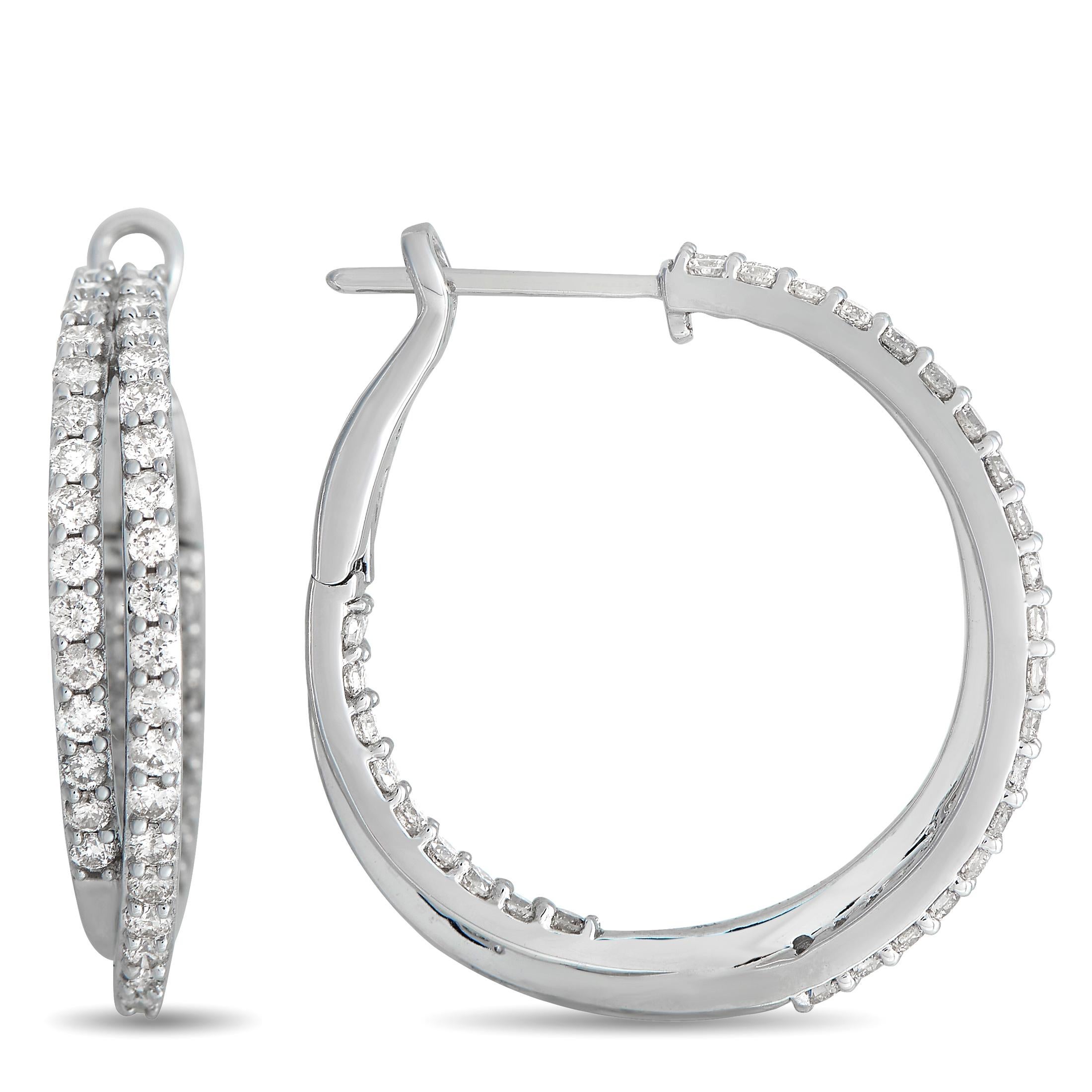 Take a look at this glittering pair of hoops you'll surely wear on repeat. The earrings are fashioned from 14K white gold and have a smooth, polished finish. Each earring has two, slim, interlocking hoops lined at the front edge and back edge with