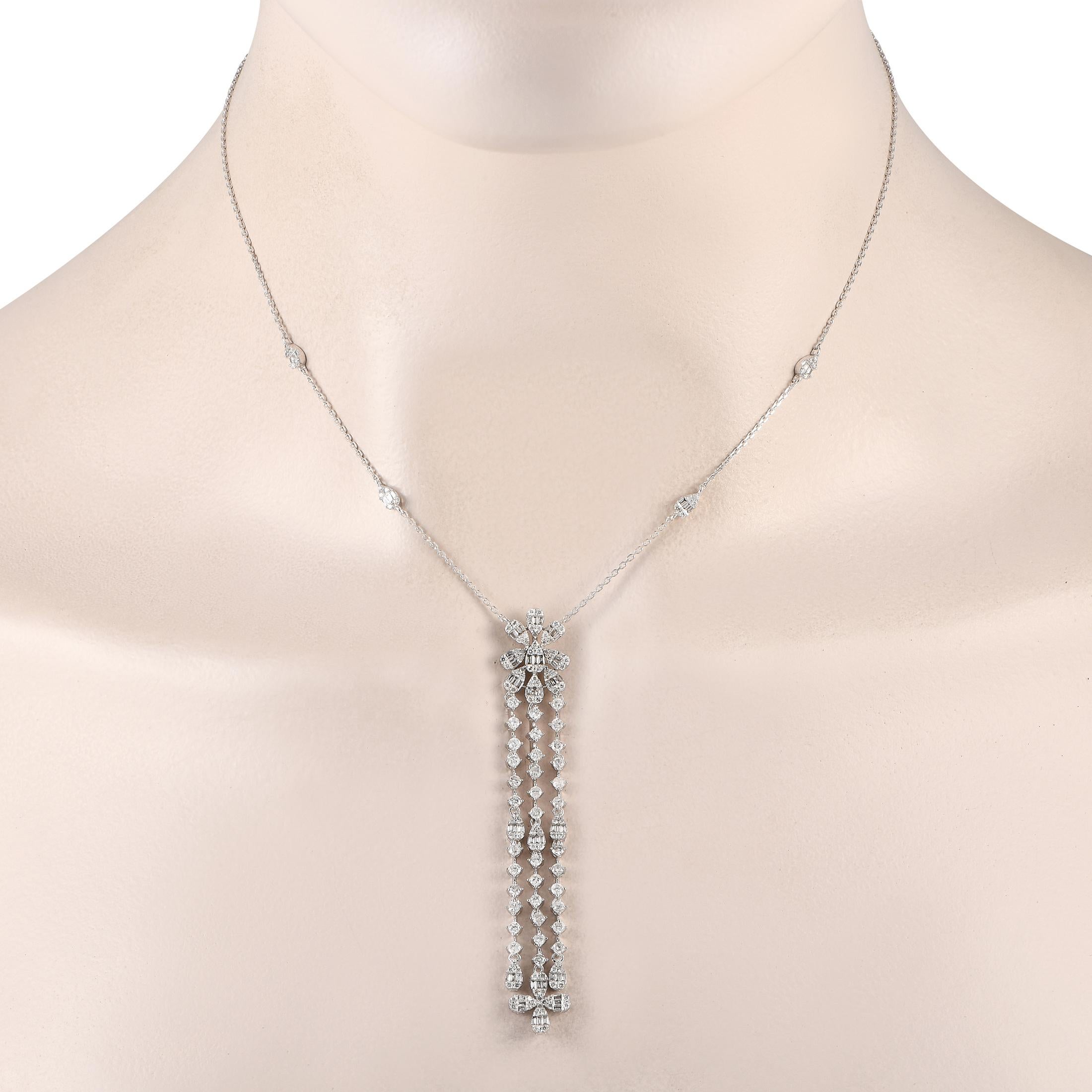 Add balance to a bold and statement-making outfit with this Y-shaped necklace's pared-down yet elegant appeal. It features a 14K white gold chain with four pear-shaped clusters of baguette and round diamonds. A central and linear element, composed