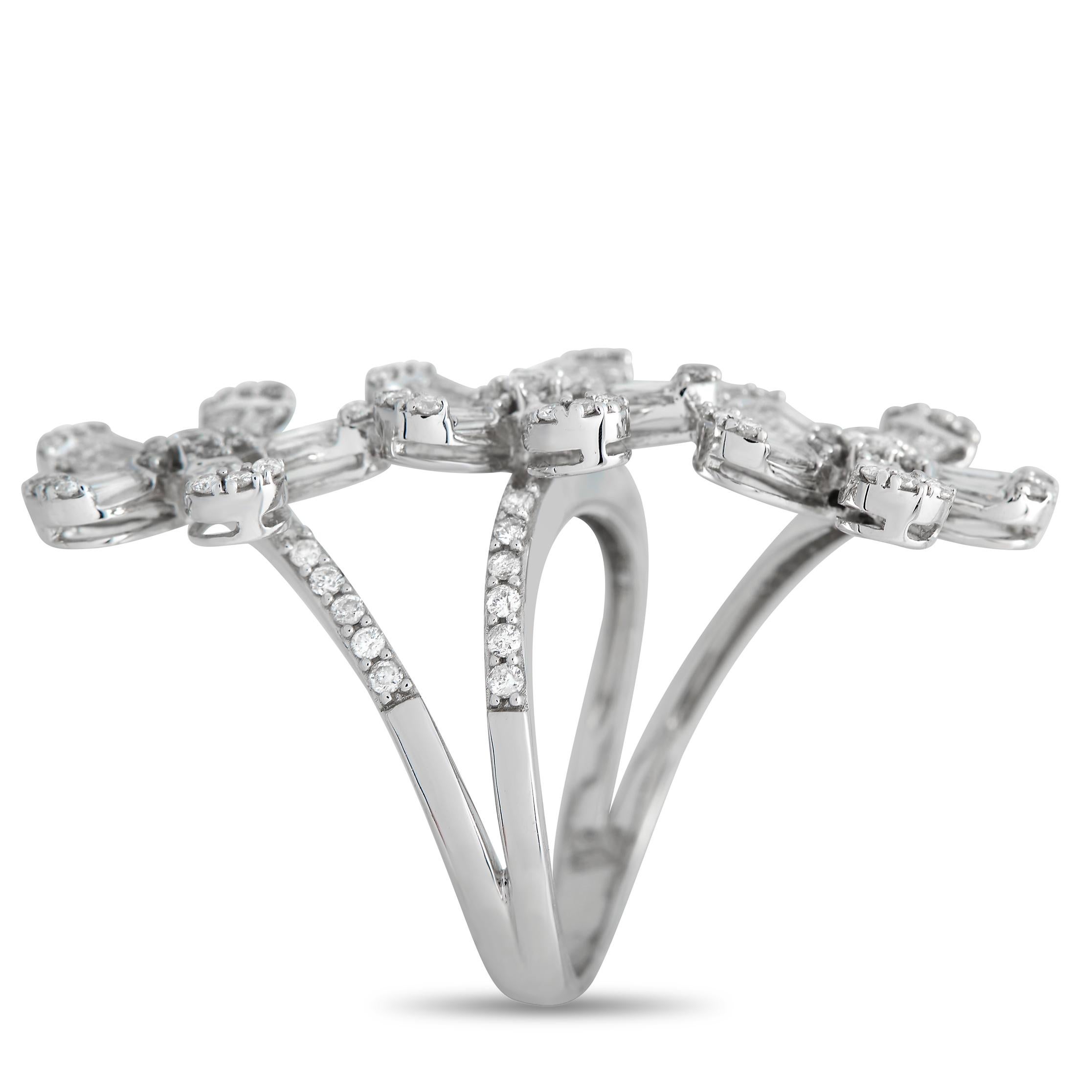 A chic bling sure to make any outfit look more interesting. This 14K white gold ring is designed with a split shank and three oversized floral centerpieces. The slim white gold band has its shoulders traced with round diamonds. Stemming from the