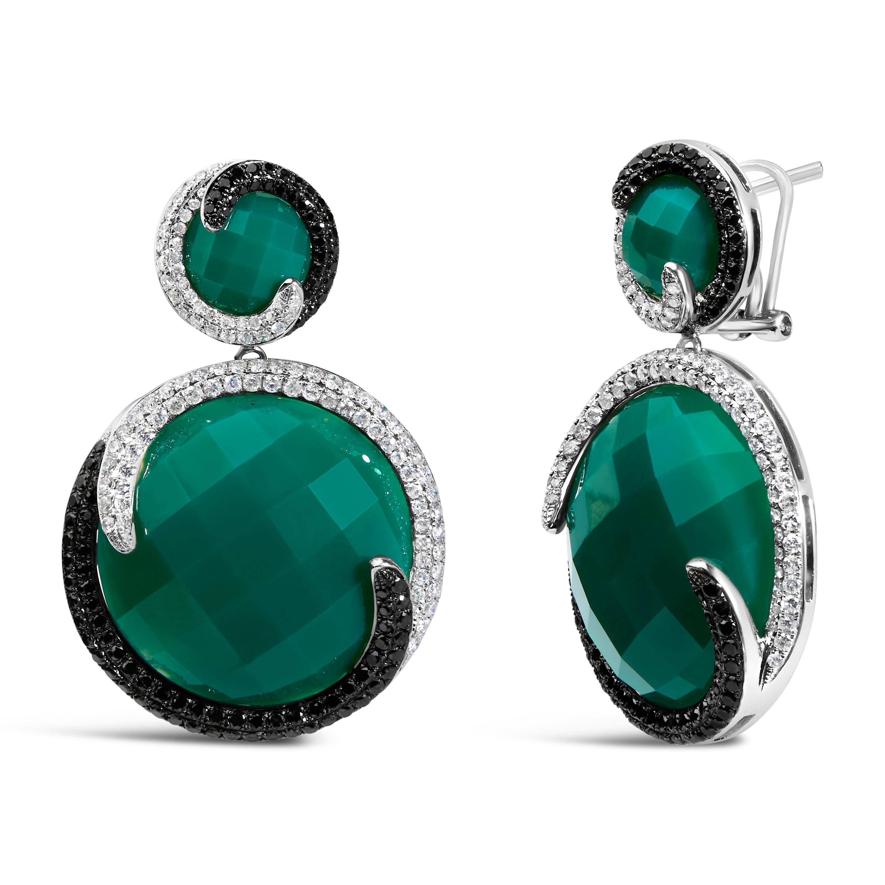 Adorn your visage with the breathtaking elegance of these 14K rhodium-plated white gold earrings, where art meets opulence in a dance of contrast and color. These unique double medallion discs captivate with their harmonious blend of natural,