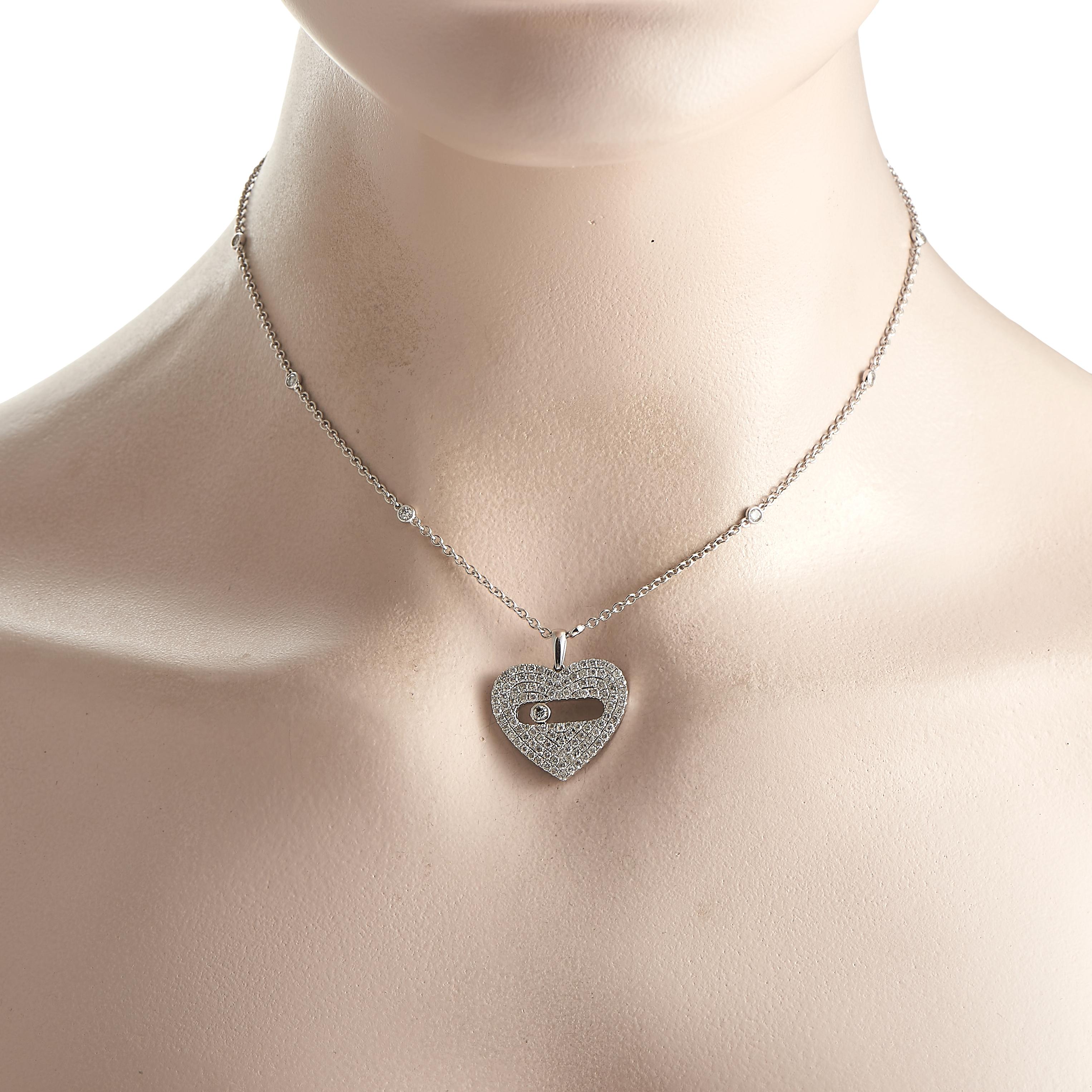 This necklace could well be what's missing in your arsenal. It features a 15 long chain with a lobster clasp and a 1 by 0.80 heart-shaped pendant. The pendant glitters with pav-set round diamonds and decorated with an elongated oval hole at the