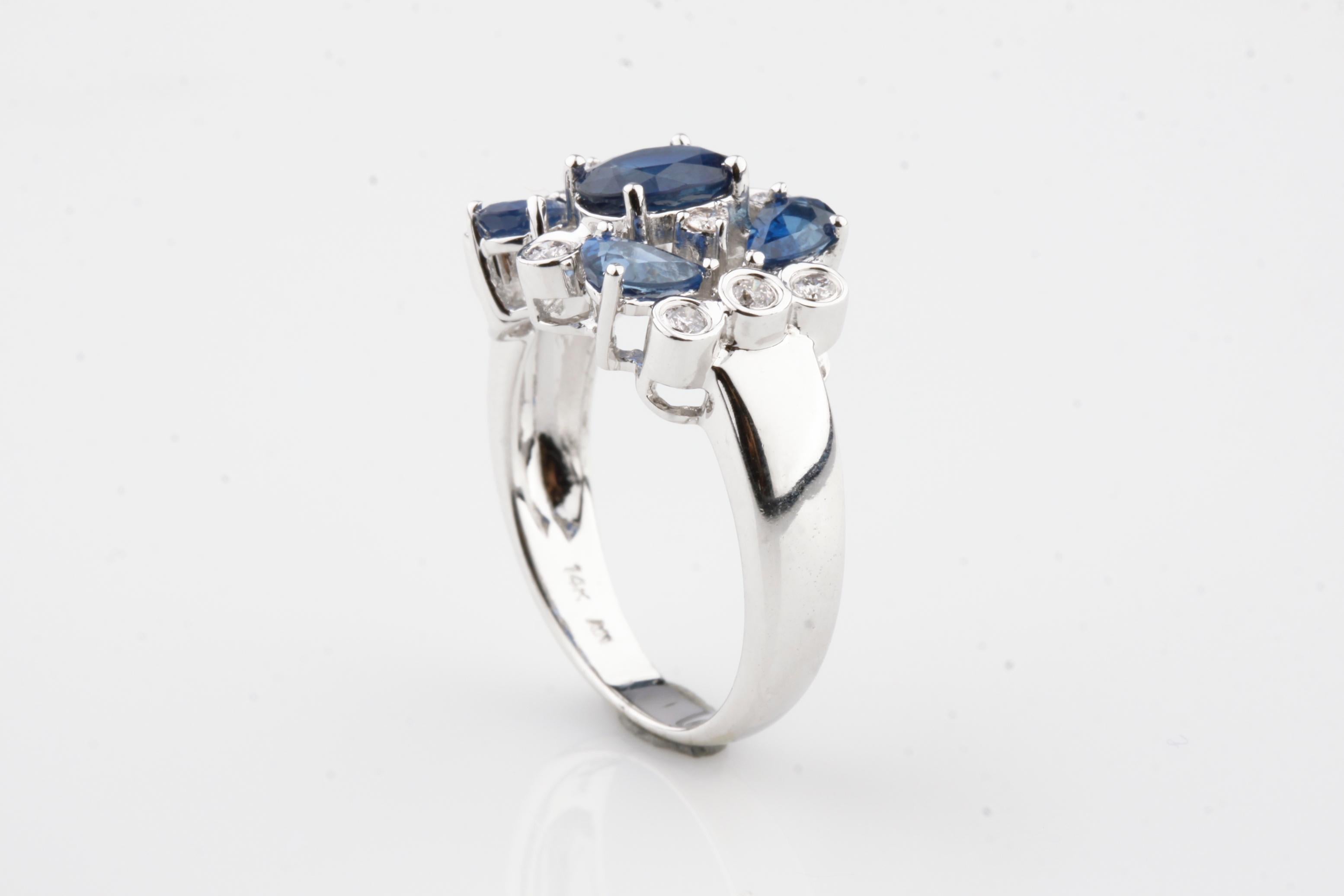 Modern 14K White Gold 2.12ct Blue Sapphire and 0.22ct Diamond Cluster Ring, Size 7.75 For Sale