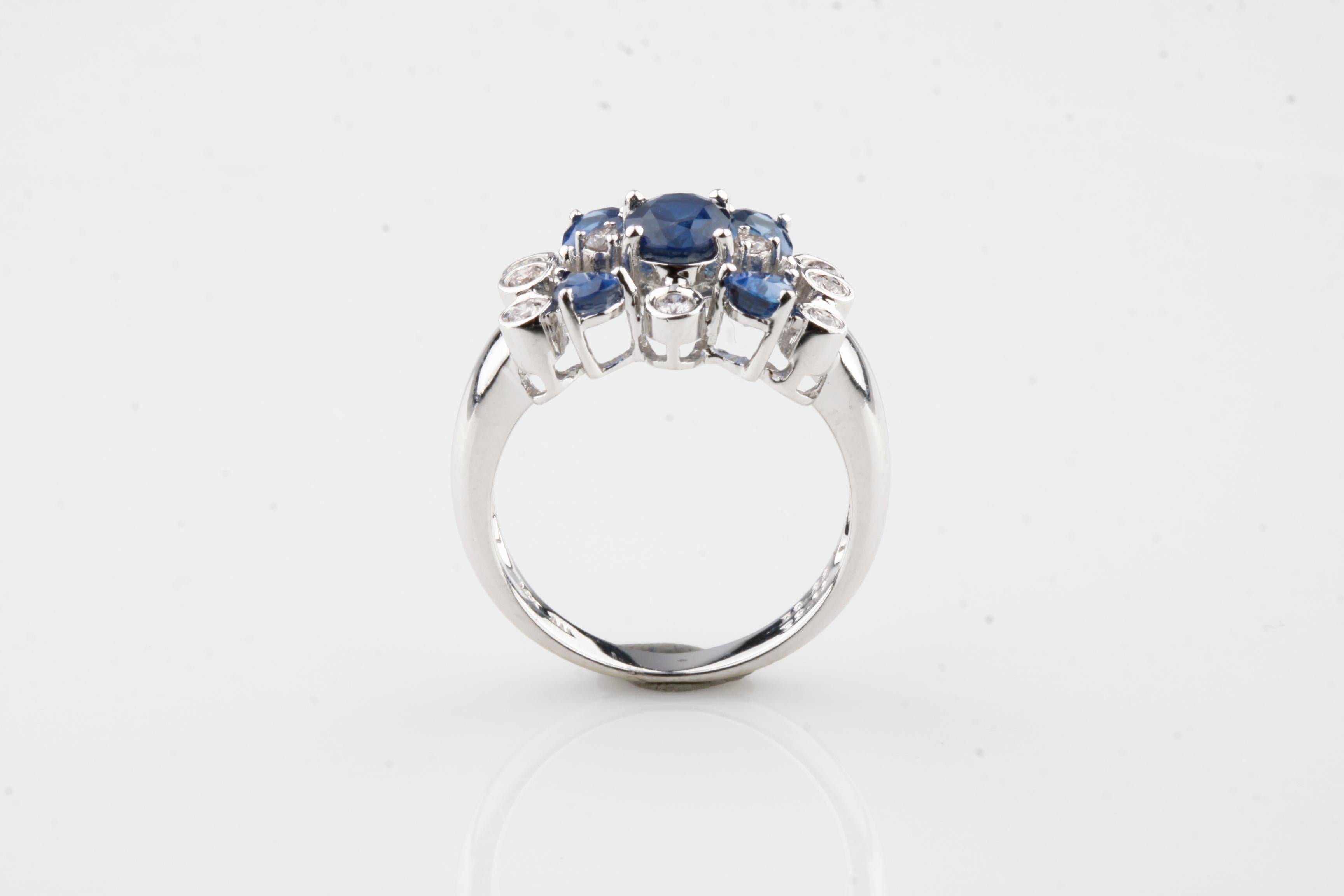 Mixed Cut 14K White Gold 2.12ct Blue Sapphire and 0.22ct Diamond Cluster Ring, Size 7.75 For Sale