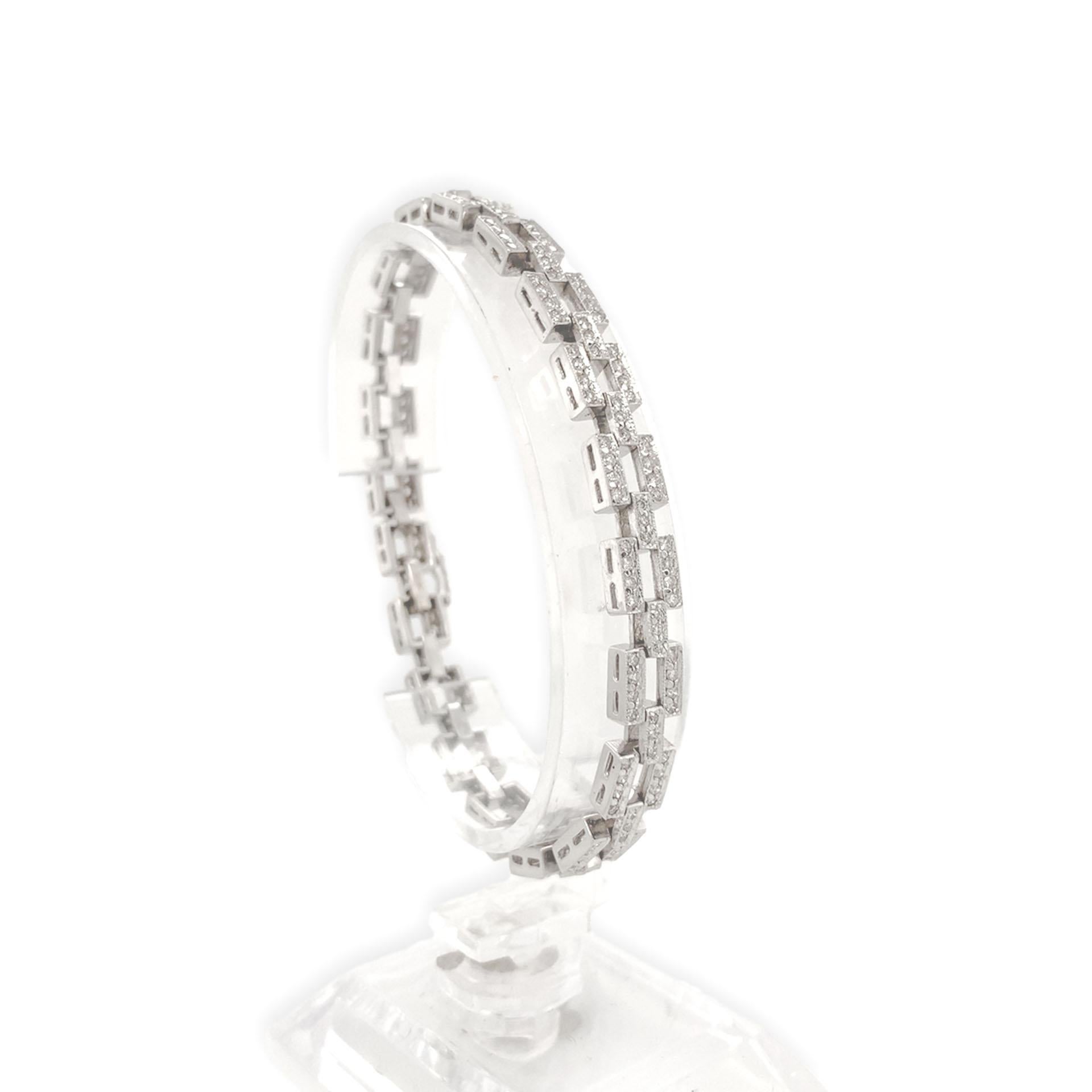 14K White gold diamond tennis bracelet with square and bar shape links. There are a total of 220 diamonds weighing about 2.20 carats total. The round brilliant cut natural earth mined diamonds measure about 1.2mm. The bracelet measures 7 1/8