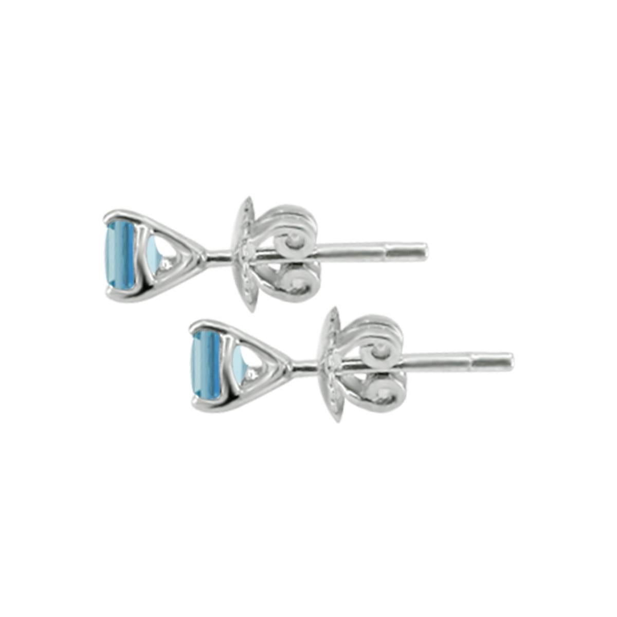 A Very Alluring Round Shaped 14K White Gold Stud Earring In A Aqua-Blue For A Surprising Variation. 
This Beautiful Earring Has A Timeless Beauty And Elegant Appeal.
The Minimalistic Design Of These 7mm Aquamarine Round Stud Earring Makes It