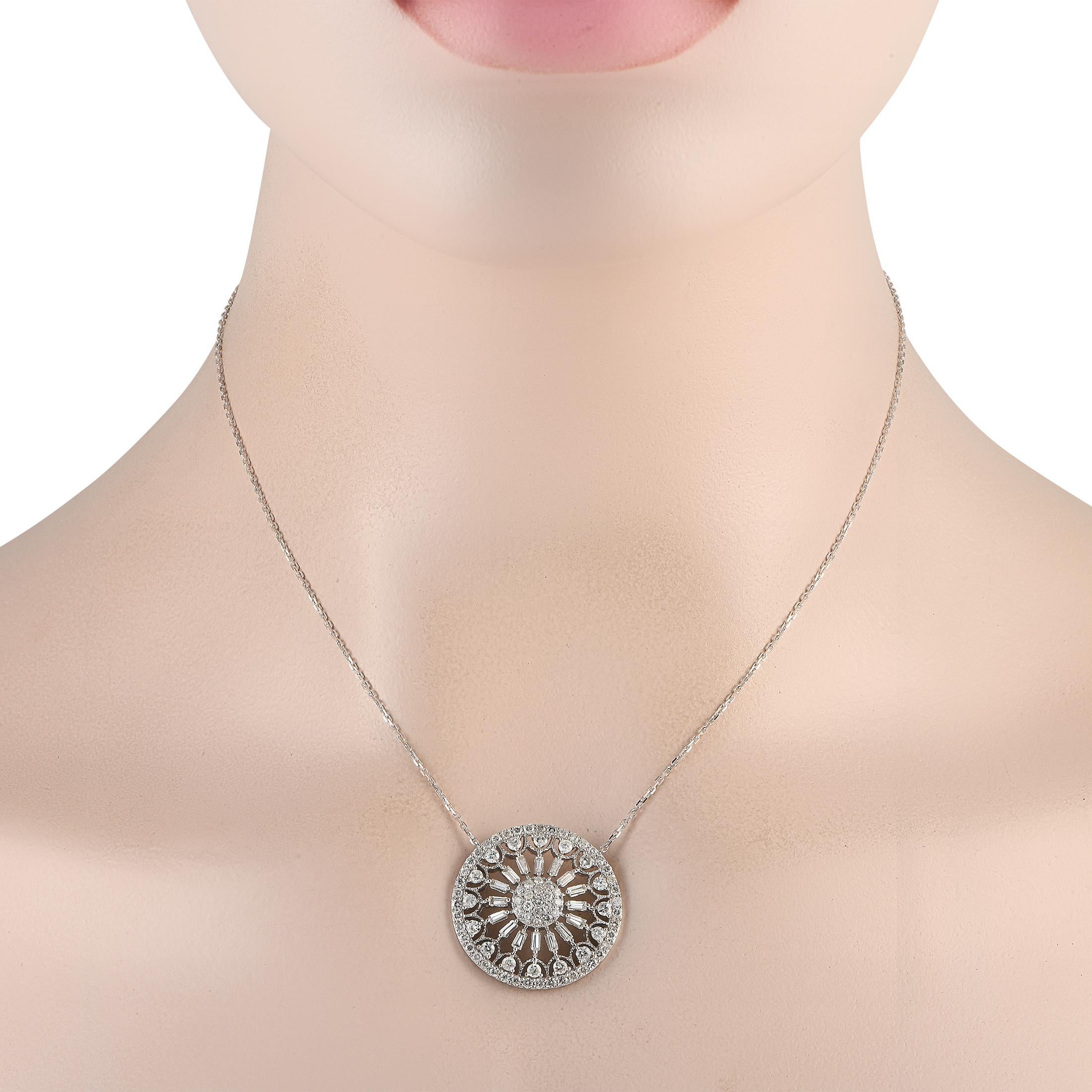 An attractive jewel that can seamlessly transition from day to night. This 14K yellow gold necklace has a 15-long chain with a lobster clasp and a 1-wide open-worked medallion-style pendant. The circular pendant with filigree detail features a
