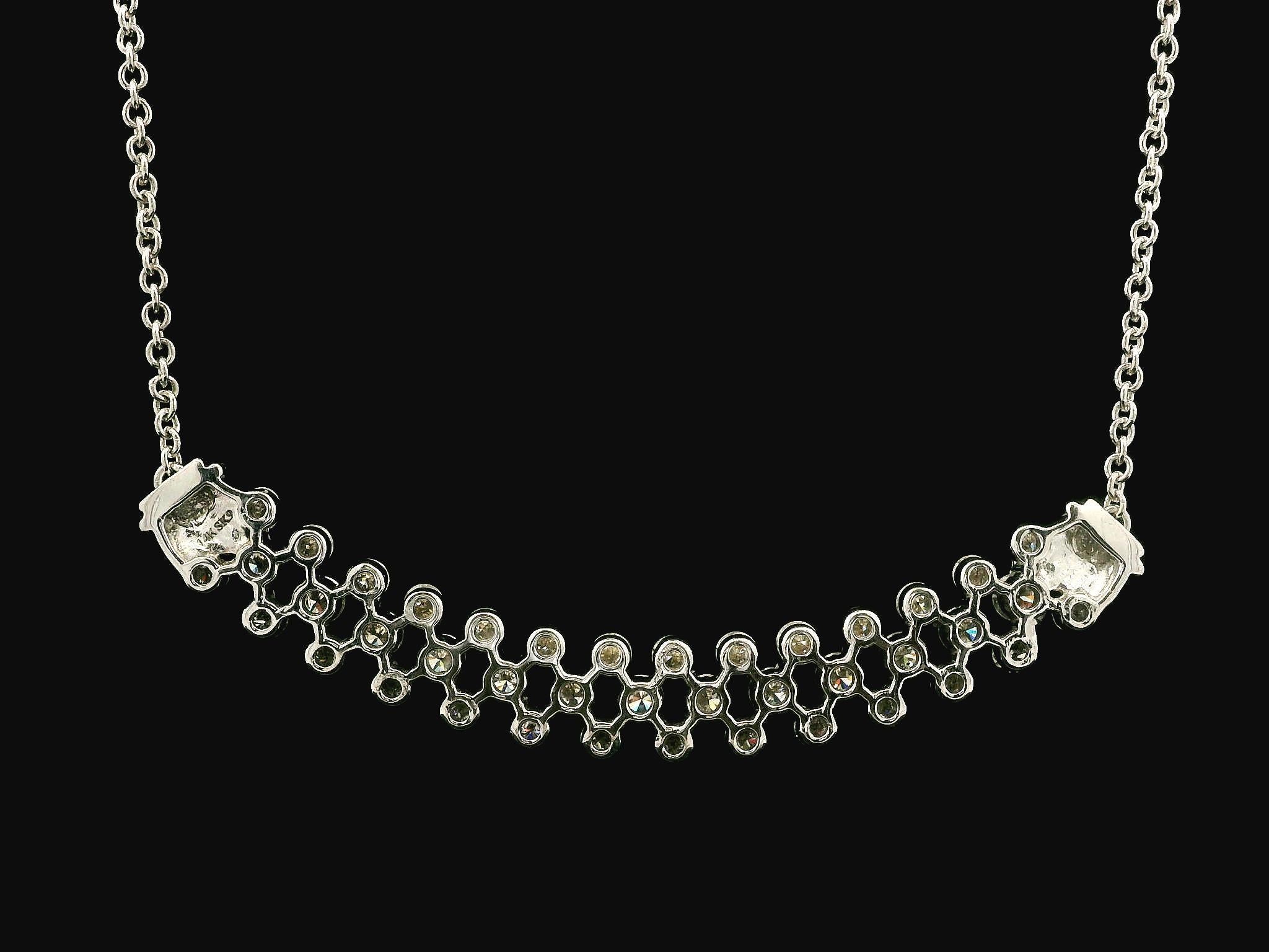 –Stone(s)–
(41) Natural Genuine Diamonds - Round Brilliant Cut - Prong Set - H-J Color - SI1-I1 Clarity - 2.25ctw (approx.)

Material: 14k Solid White Gold
Weight: 8.02 Grams
Chain Type: 17” - 0.9mm Cable Link  - Lobster Clasp
Pendant Height: 7.2mm
