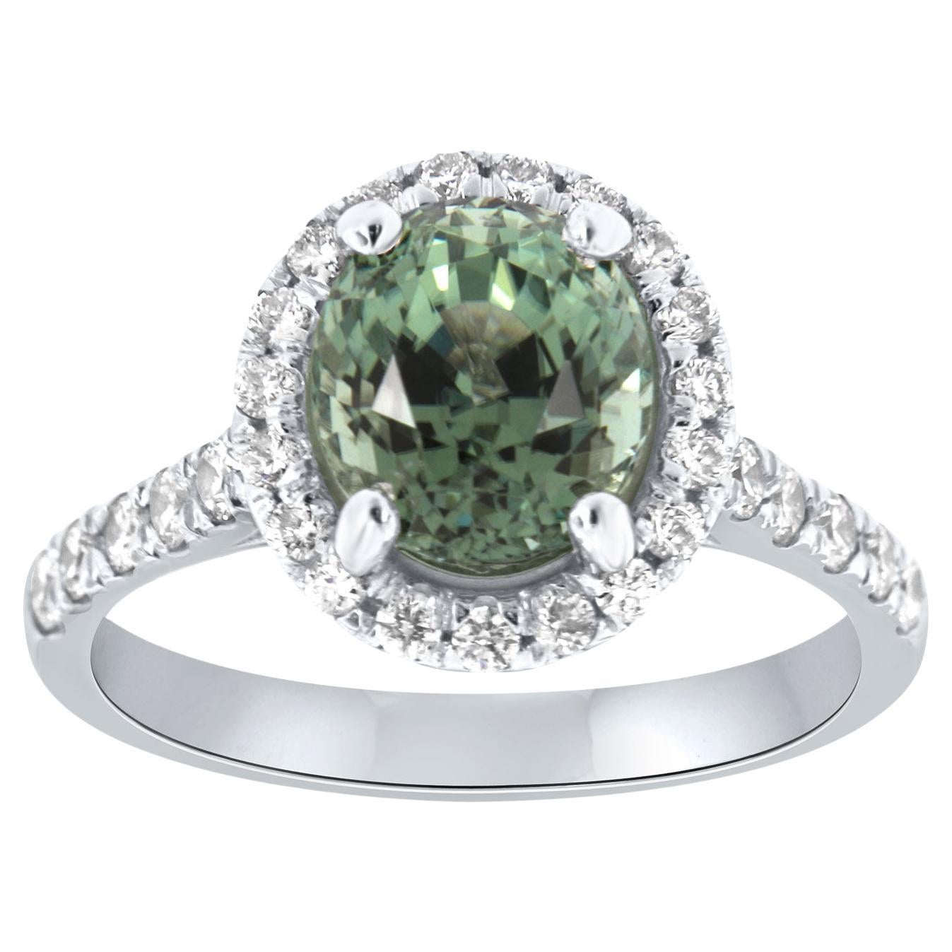 14K White Gold 2.47 Carat Oval Green Tourmaline Halo Diamond Ring For Sale