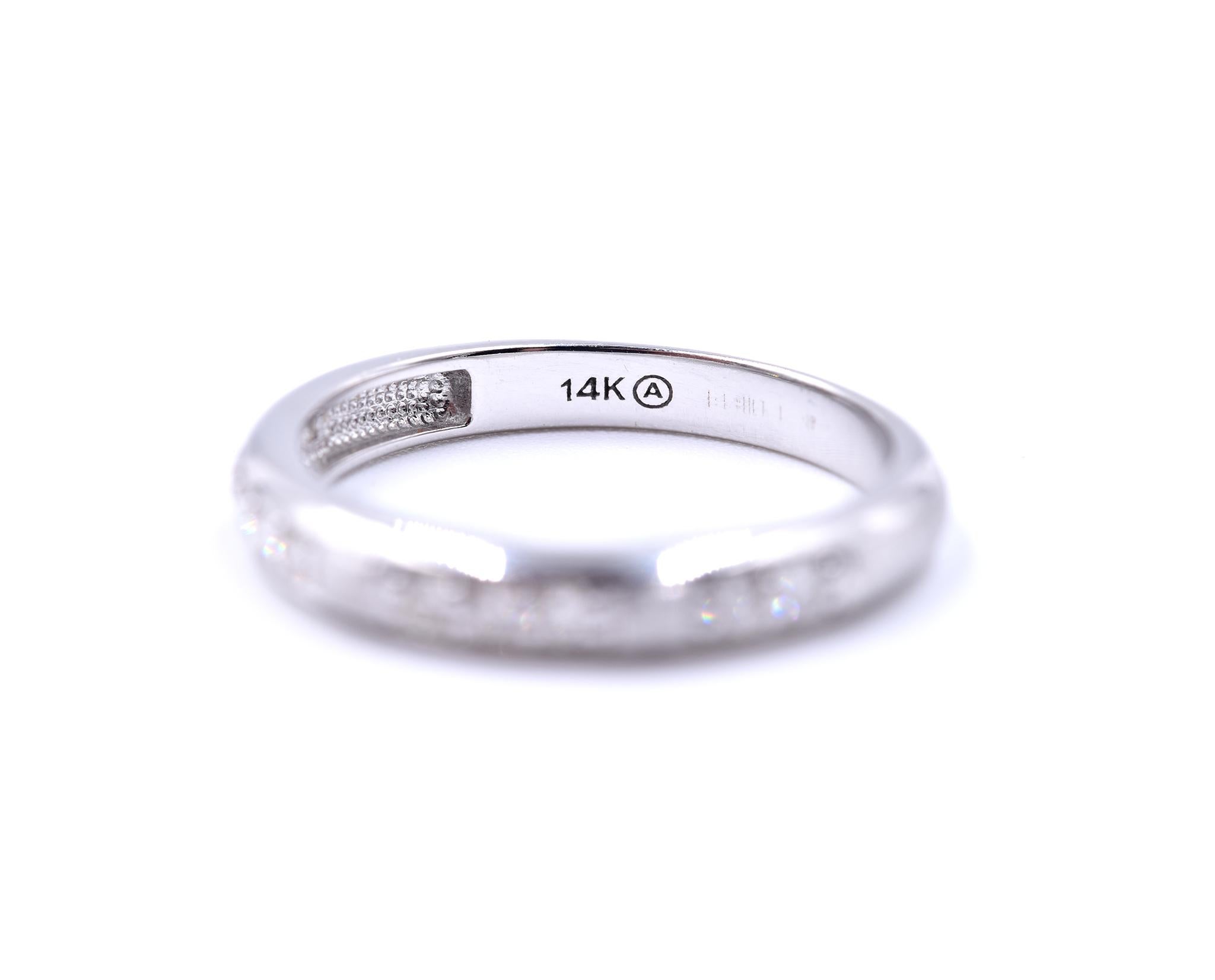 Designer: custom design
Material: 14k white gold
Diamonds: 10 round brilliant cut= .24cttw
Color: G
Clarity: VS
Size: 7 (please allow two additional shipping days for sizing requests)
Dimensions: ring is 2.53mm wide
Weight: 2.53 grams
