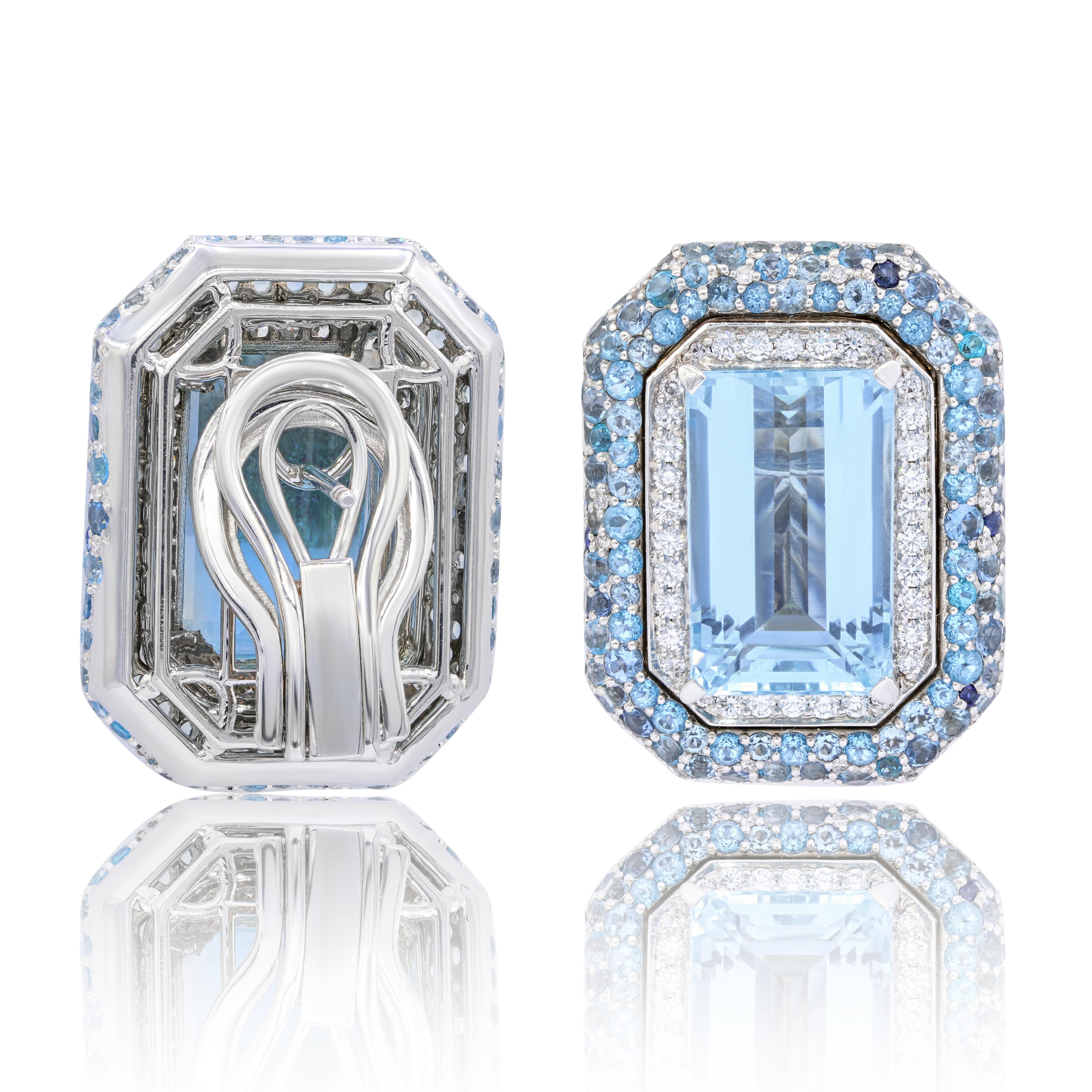 14KT White gold aquamarine diamond earrings with center 25.00 ct aquamarine emerald shape set in diamond setting features 2.00 ct  blue round diamonds