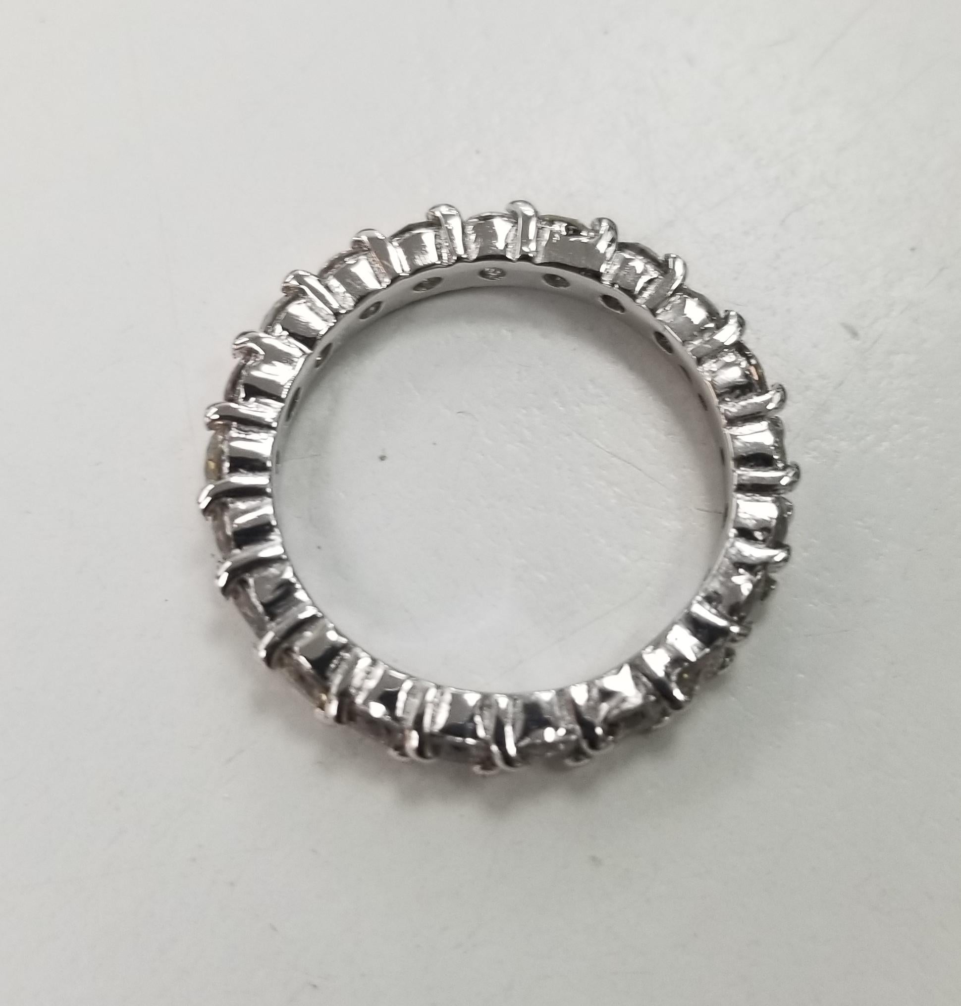 Round Cut 14 Karat White Gold Wide Diamond Eternity with Shared Prongs For Sale