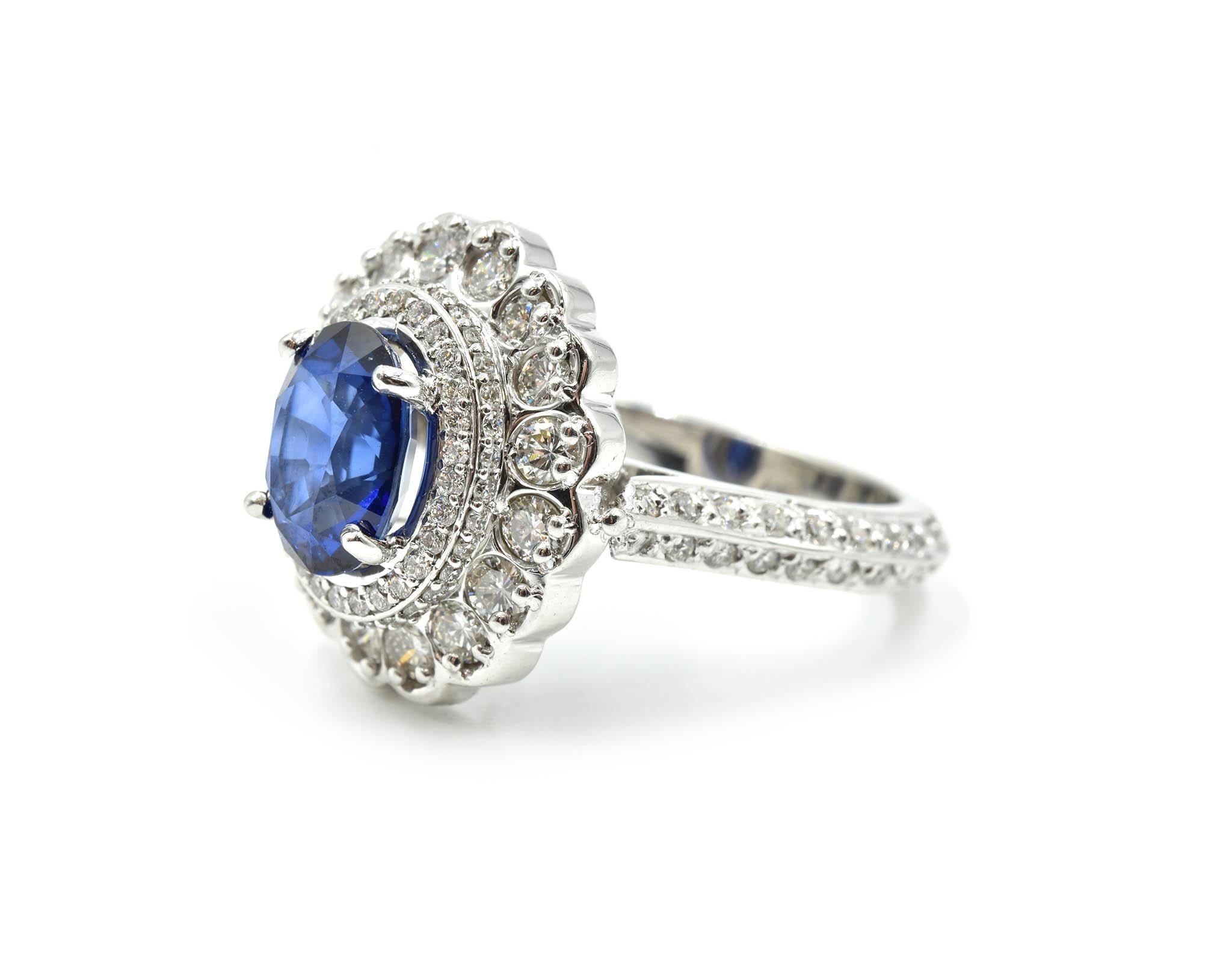 Modern 14k White Gold 2.95ct Oval Blue Sapphire, and 2.07cttw Round Diamond Halo Ring 