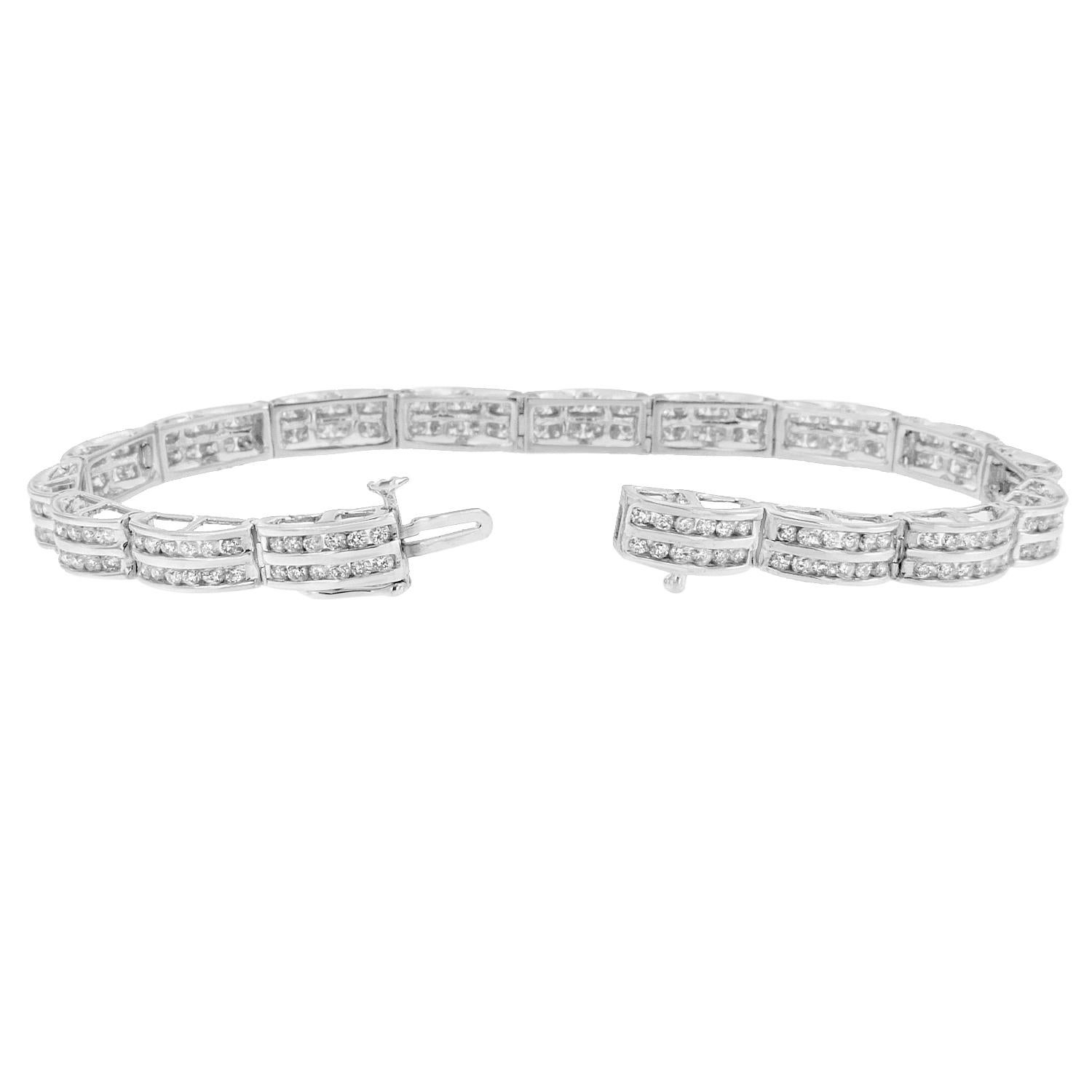 Glittering sweetly, this diamond tennis style bracelet is stylish for an everyday look. Created with 14 karats white gold, this stunning bracelet adds a subtle shimmer. Featuring chain like design, the unique setting with sparkling round cut