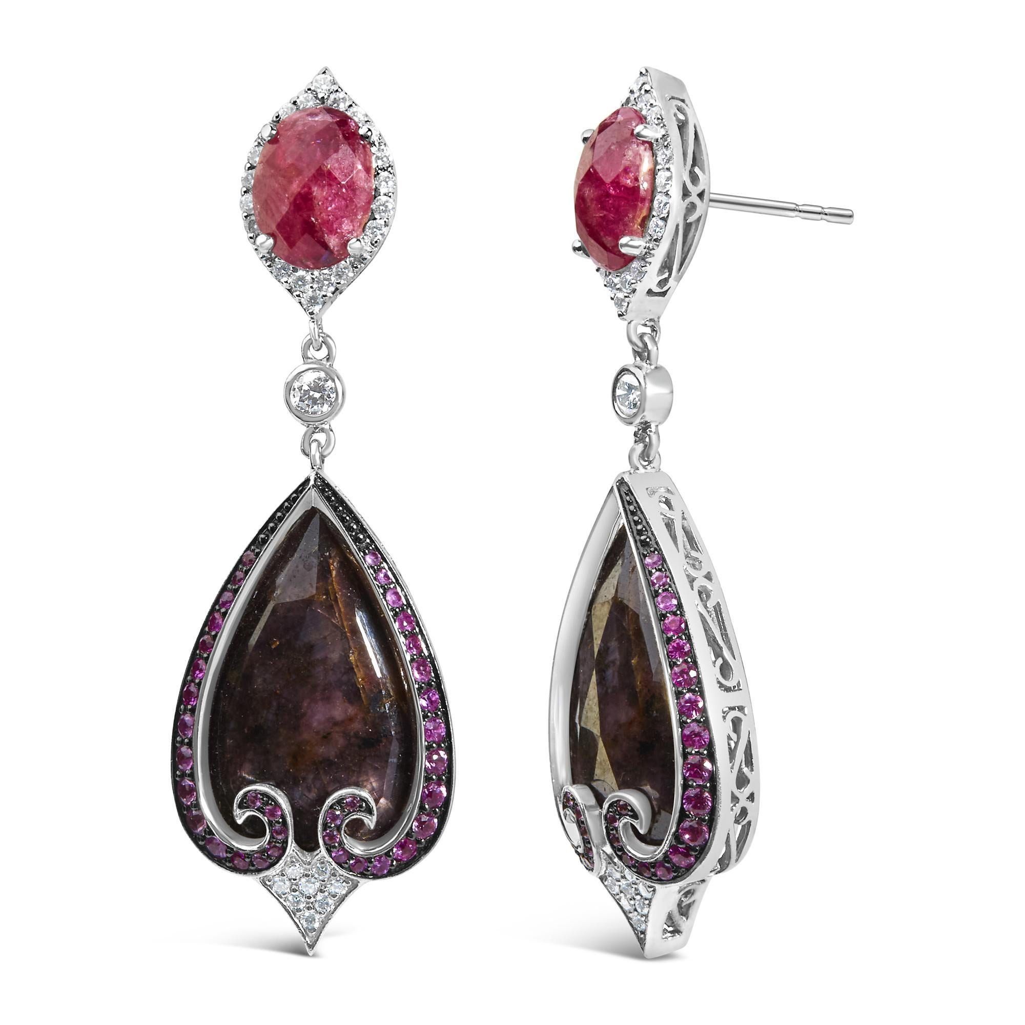 Discover the elegance of yesteryear with these exquisite 14K white gold drop earrings, radiating sophistication with a modern twist. These treasures are meticulously crafted with rhodium-plated finishes, promising an everlasting shine that captures