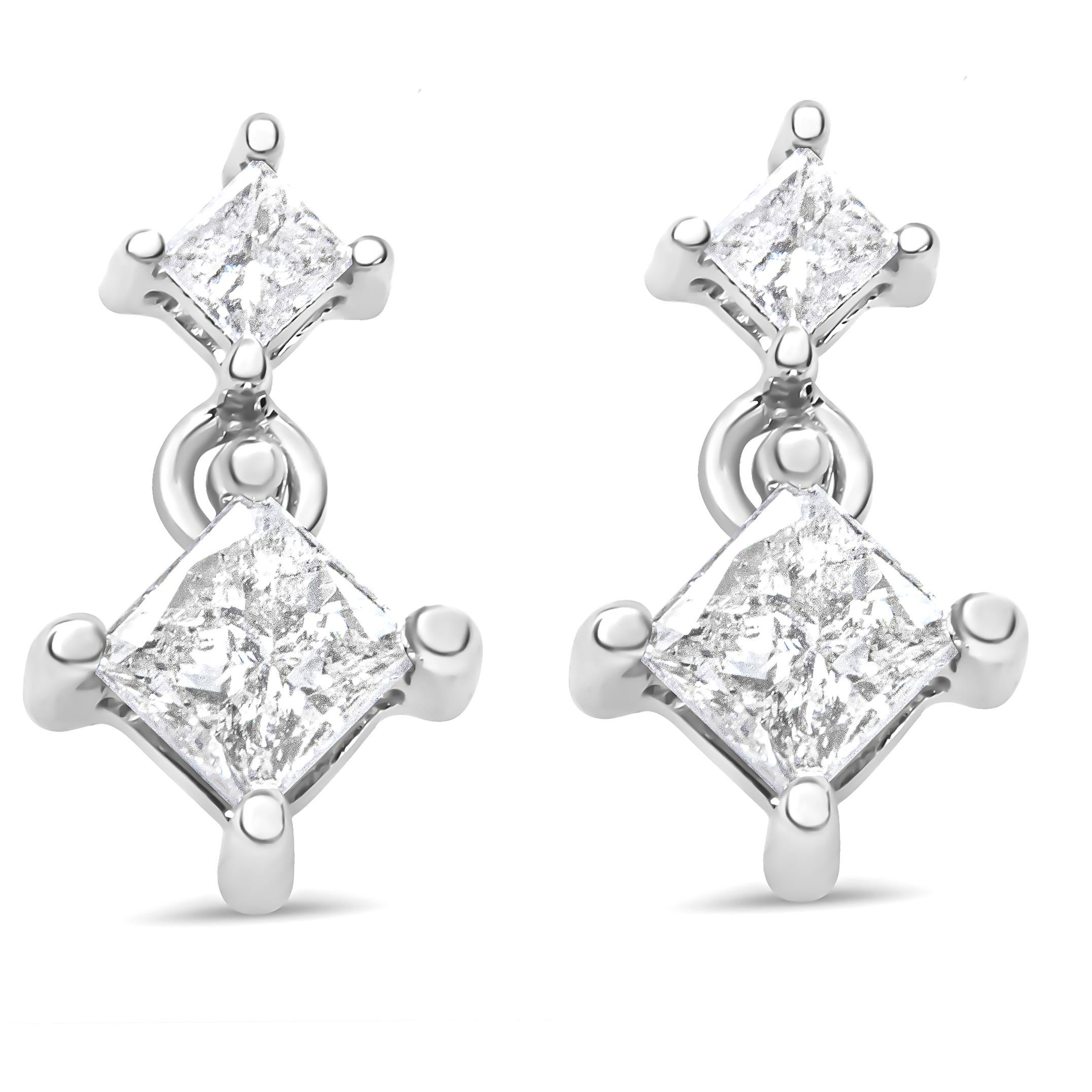 Zhuzh up your everyday jewelry by donning this stud-drop pair that amps up the elegant feel. Each side comprises two natural princess-cut diamonds in varying sizes that total up to 3/8 cttw, and they’re secured with a prong setting. The classic