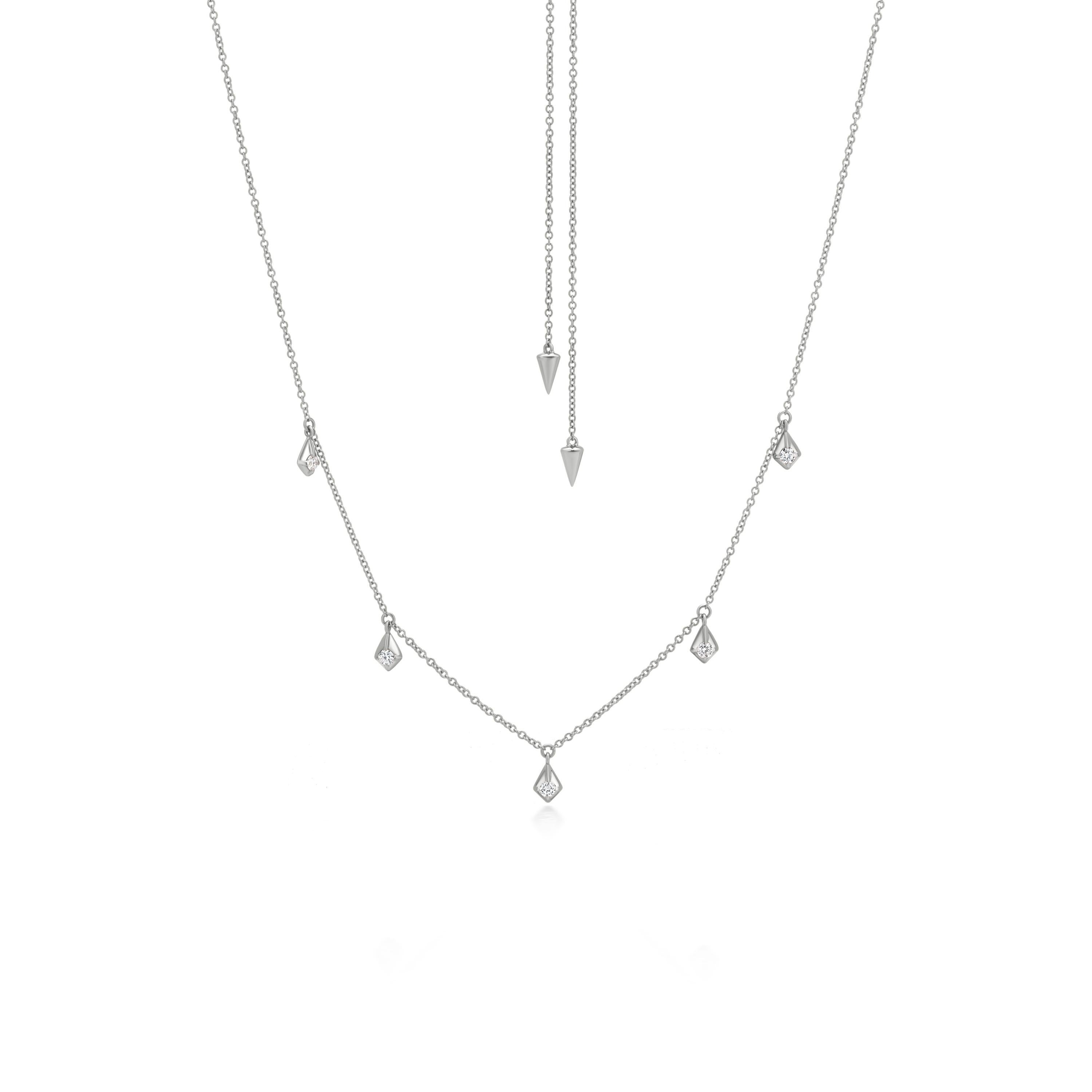 This Luxle magnificent 14K White Gold necklace, reimagined by the artisans, is a timeless motif. Several diamond-shaped motifs studded with 0.36 Ct round full-cut diamonds cascade down the gold chain, creating an elegant touch. A box clasp is