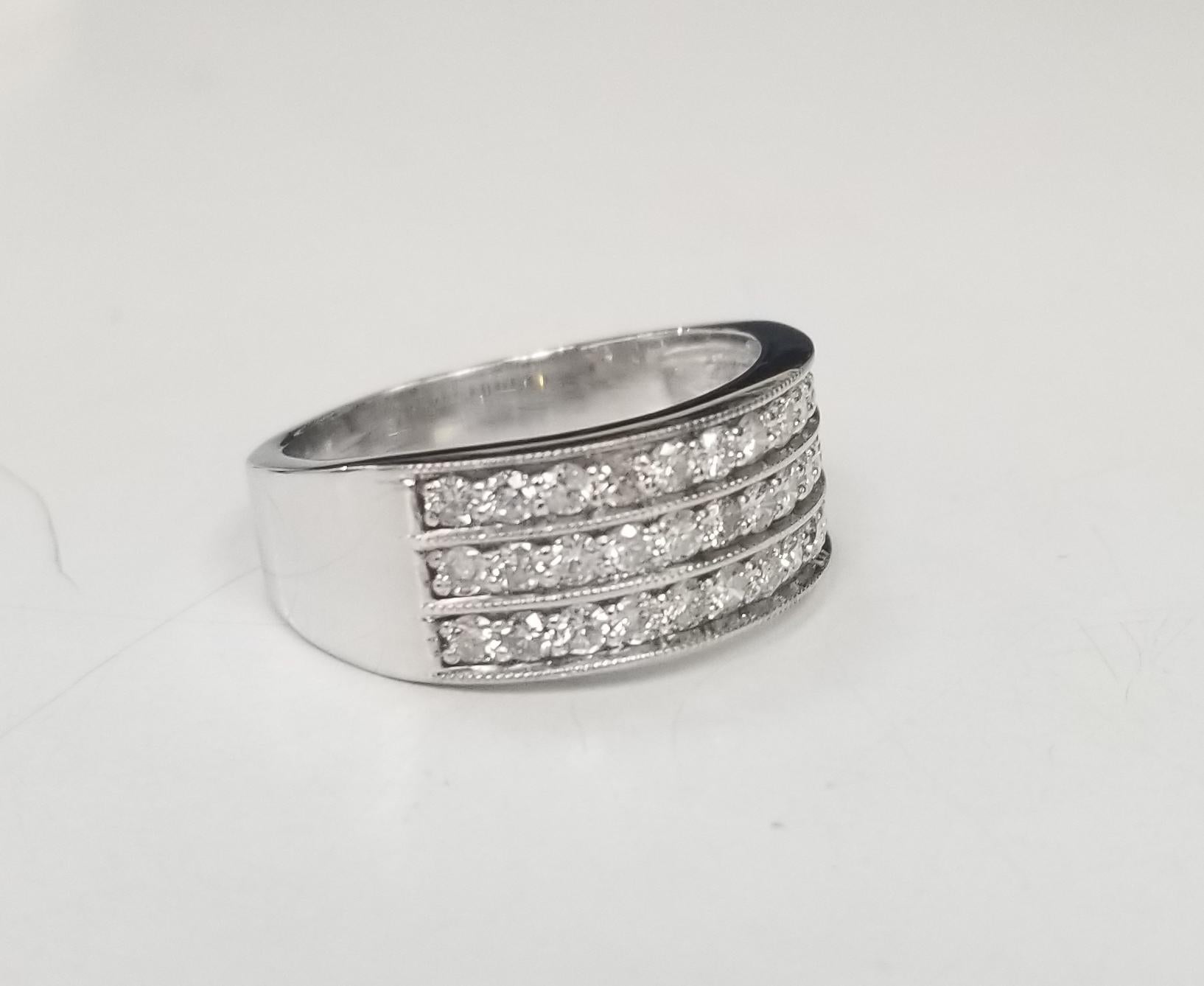 Specifications:
    main stone: 36 DIAMOND 
    carat total weight:  1.03 CTW 
    color:G
    clarity:VS2-SI1
    metal:WHITE GOLD
    type:ring
    weight: 6.05 gr
    size: 7 US
    hallmark:14K
