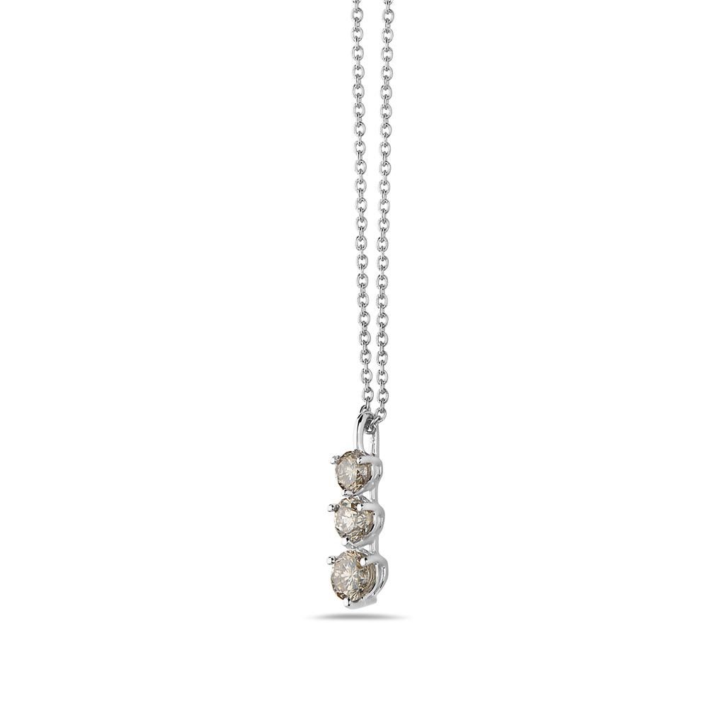 This pendant features 3 graduated round diamonds set in 14K gold. Made in USA. 