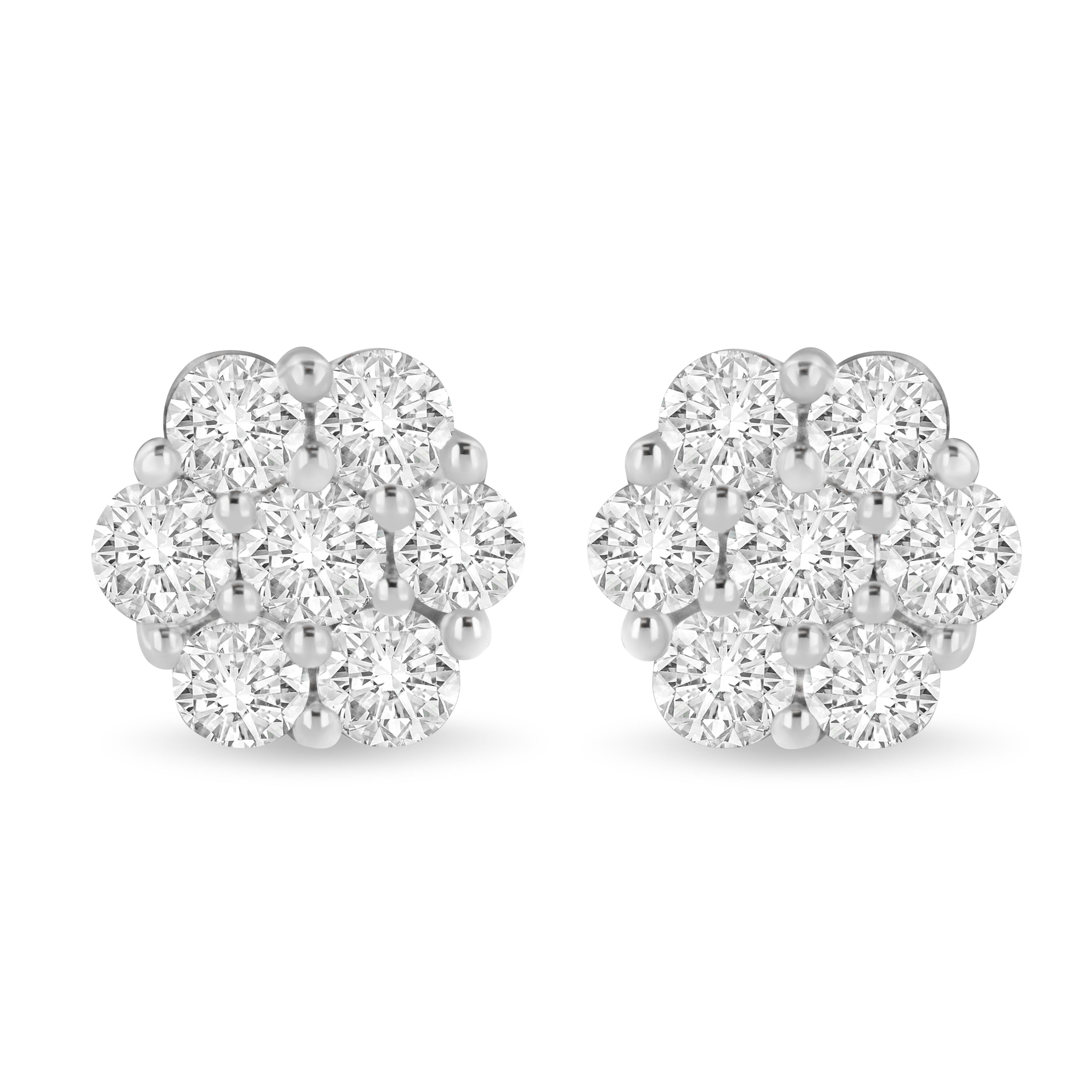 These gorgeous floral cluster studs are made with 7 natural, round-cut diamonds each. Designed in the finest 14k white gold, these earrings boast an impressive total diamond weight of 3 ct. This piece is the perfect accessory for any formal night