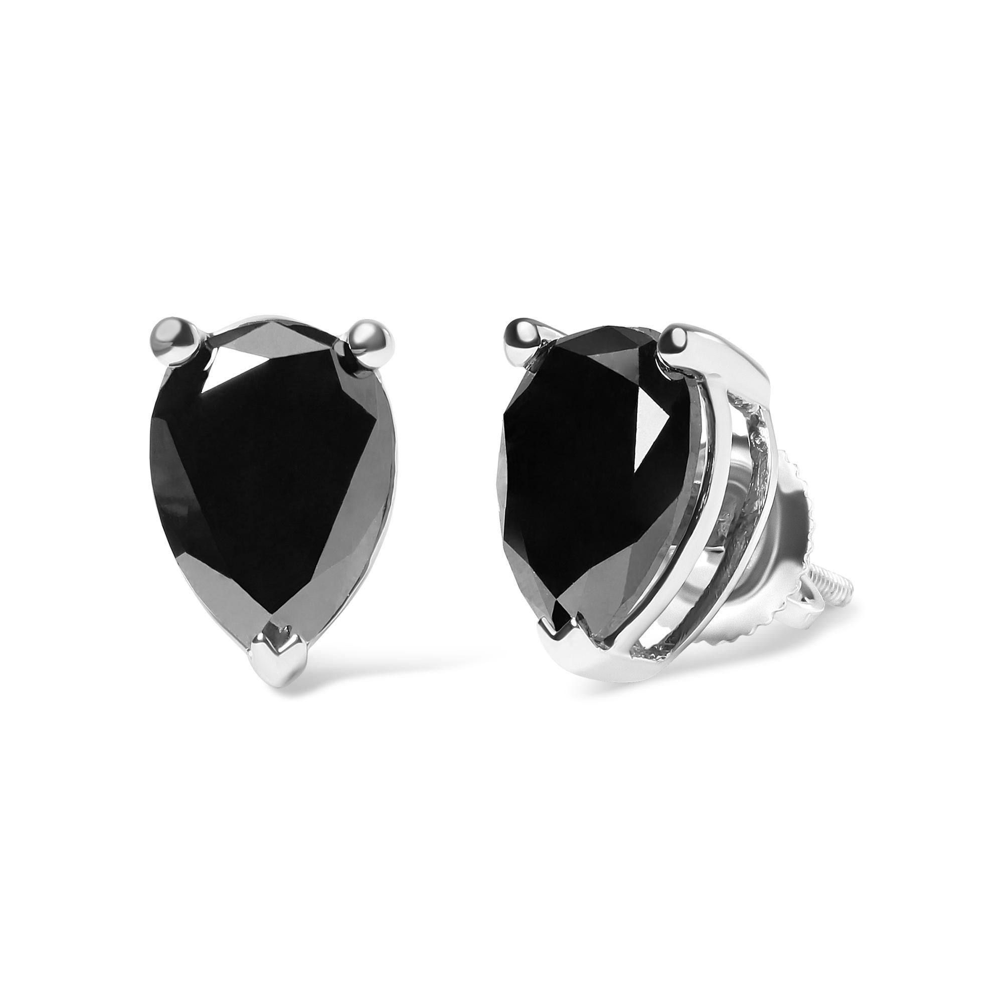 Laissez-vous séduire par l'élégance intemporelle de l'or blanc 14 carats avec ces étonnantes boucles d'oreilles solitaires en diamant noir en forme de poire. Le design complexe présente deux magnifiques diamants noirs, pesant chacun 1,5 carat pour