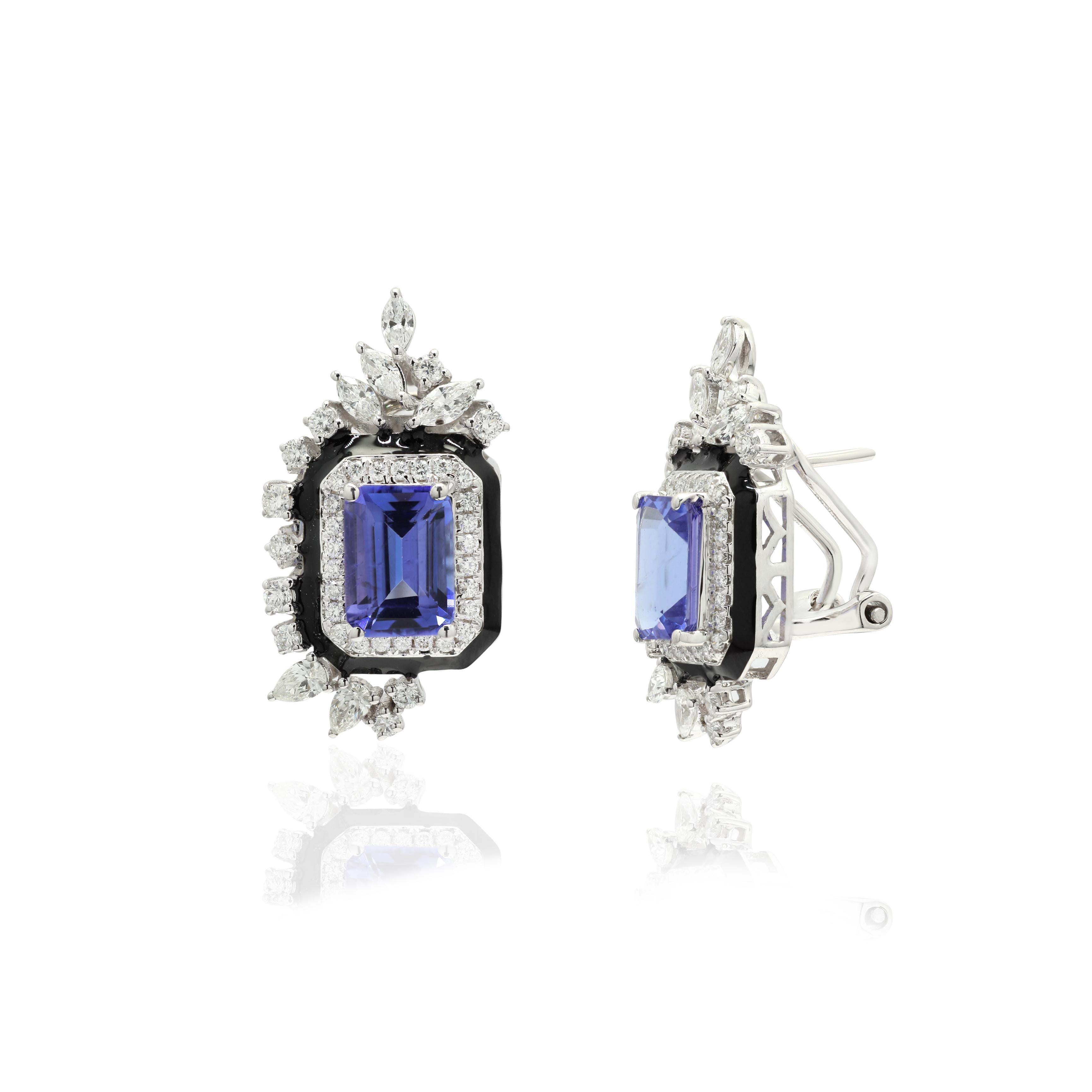 Studs create a subtle beauty while showcasing the colors of the natural precious gemstones and illuminating diamonds making a statement.
Tanzanite studs with diamonds in 14K gold. Embrace your look with these stunning pair of earrings suitable for