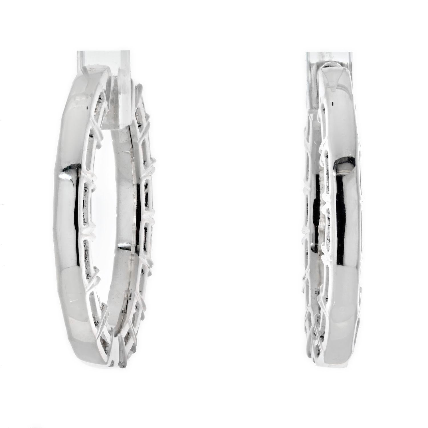 We are so in love with straight cut diamonds especially when they are used for diamond hoop earrings like these sweet hoops. Made with emerald cut diamonds that are mounted inside and out these hoops are truly something special! Not only are these