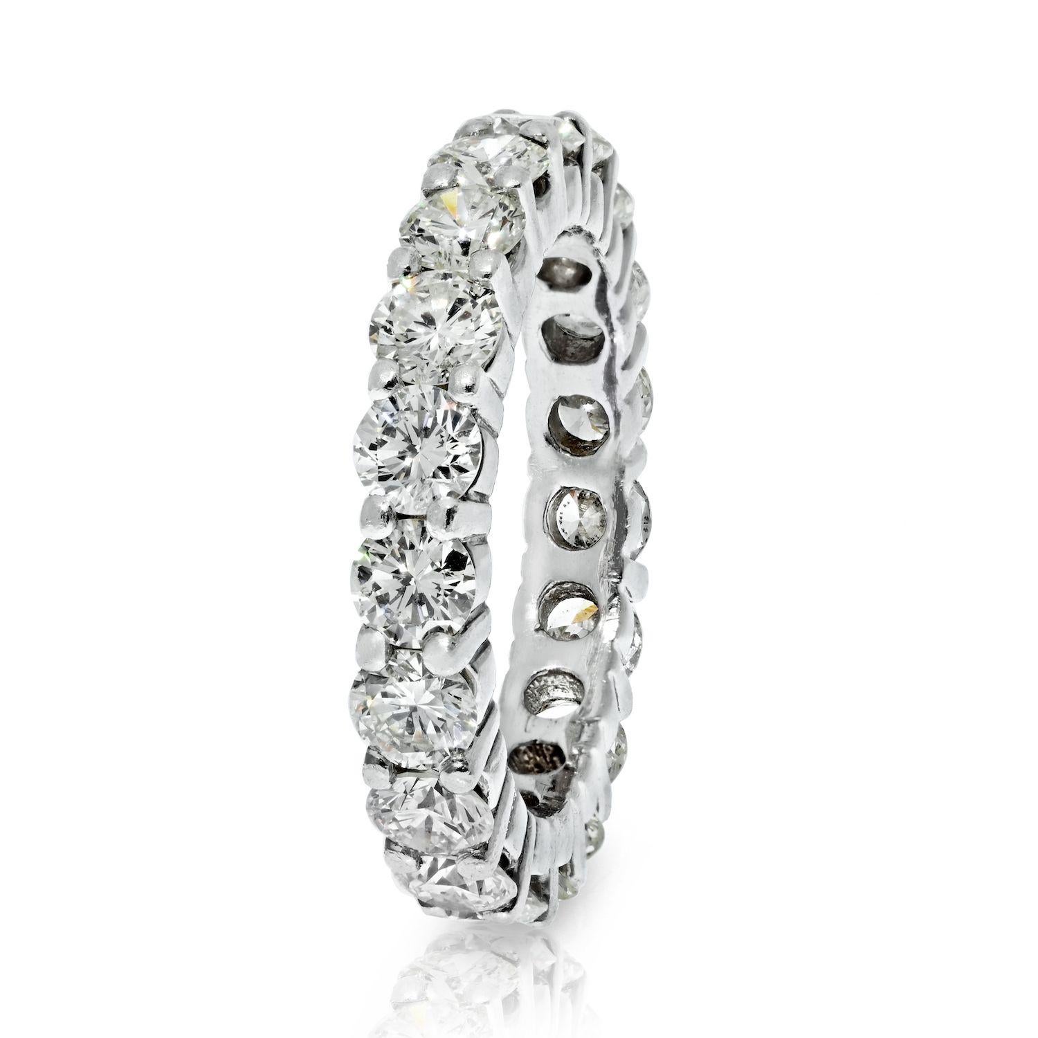 Made in 14k white gold this is a perfect eternity band when all you are after is a classic round eternity ring. Use it as a wedding band, a stackable or as a fun right hand ring, you decide! Made with 3.50 carats of round natural diamonds this ring