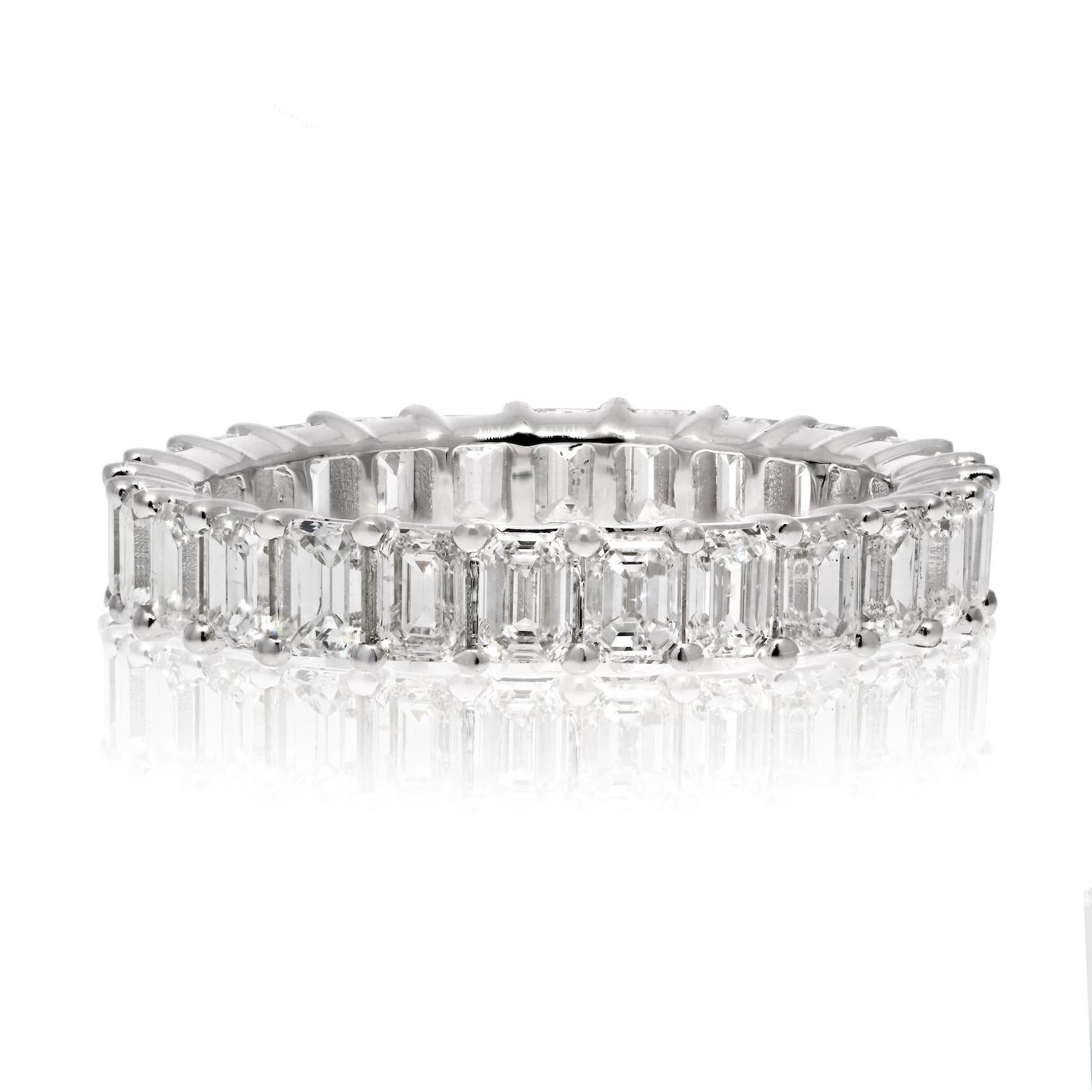 Step into a world of timeless elegance with this stunning 14K White Gold Emerald Cut Diamond Eternity Band. 

Exquisitely crafted, this eternity band features 26 emerald-cut diamonds, totaling an impressive 3.50 carats, beautifully aligned in an