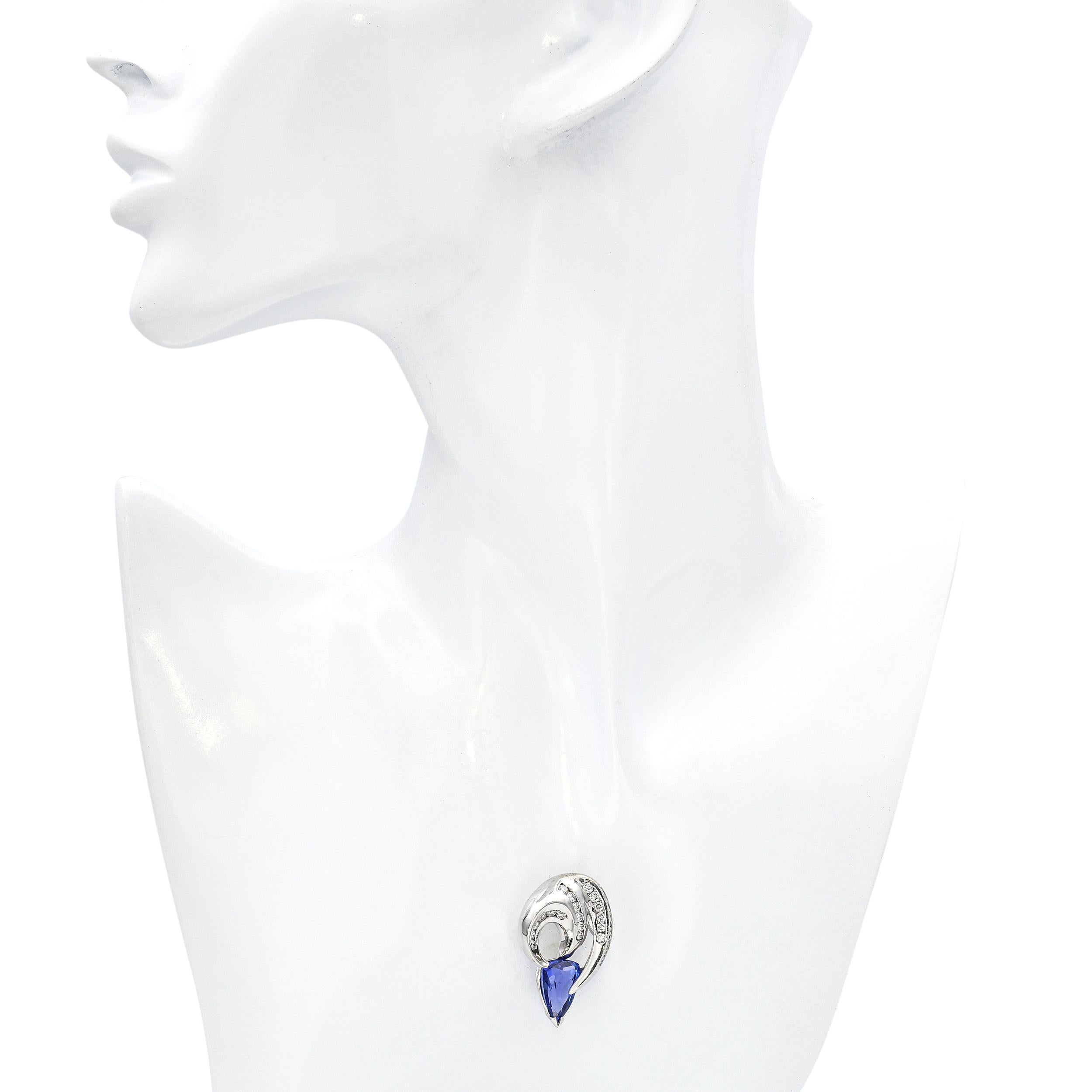 Modern 14k White Gold 3.58ct Tanzanite and Diamond Pendant For Sale