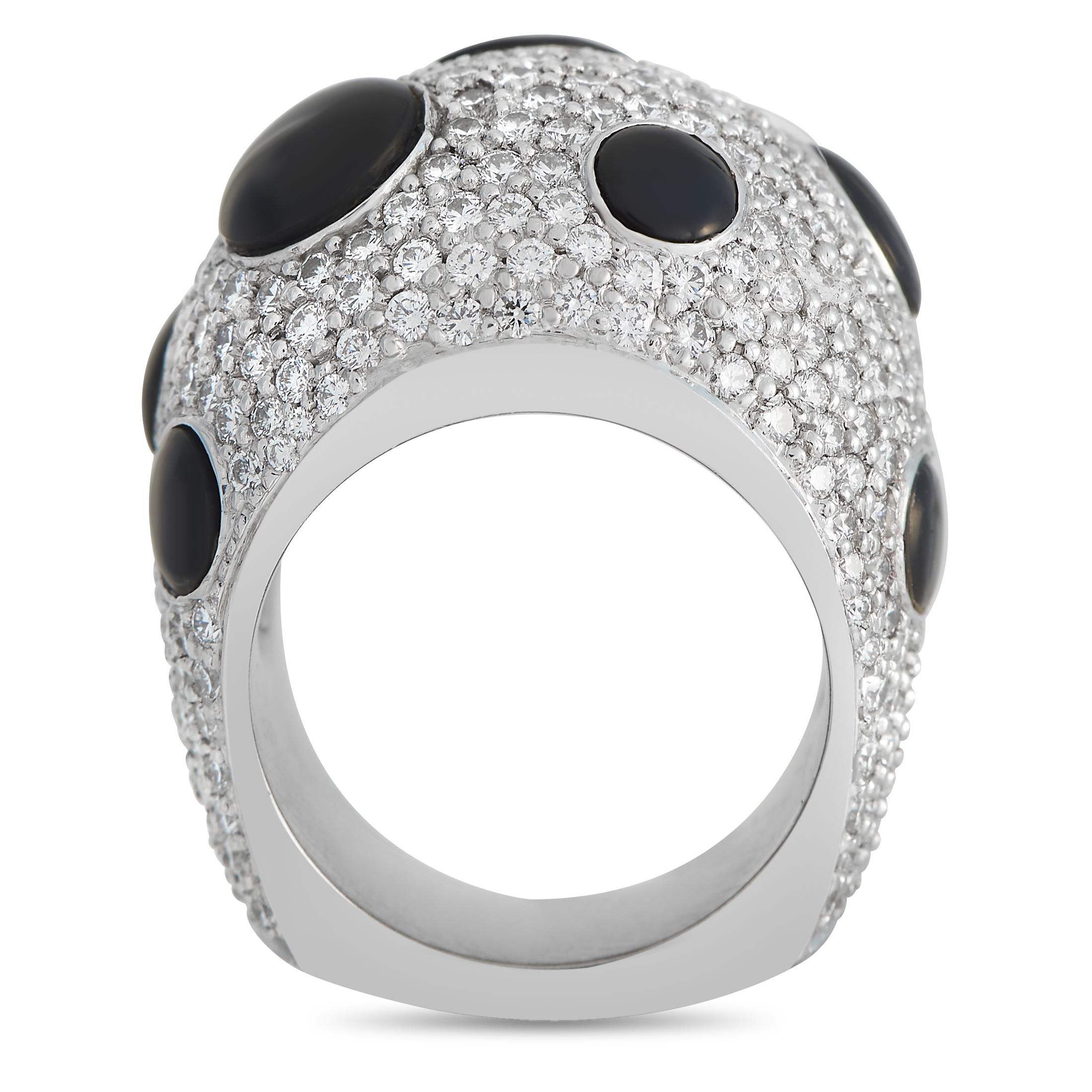 A daring choice. Bold, large, and showy, this statement ring is impossible to miss. Its oversized Euro shank measures 12mm thick, with a top height of 9mm. The ring has a square-shaped bottom edge and a high-dome top covered with pav-set with